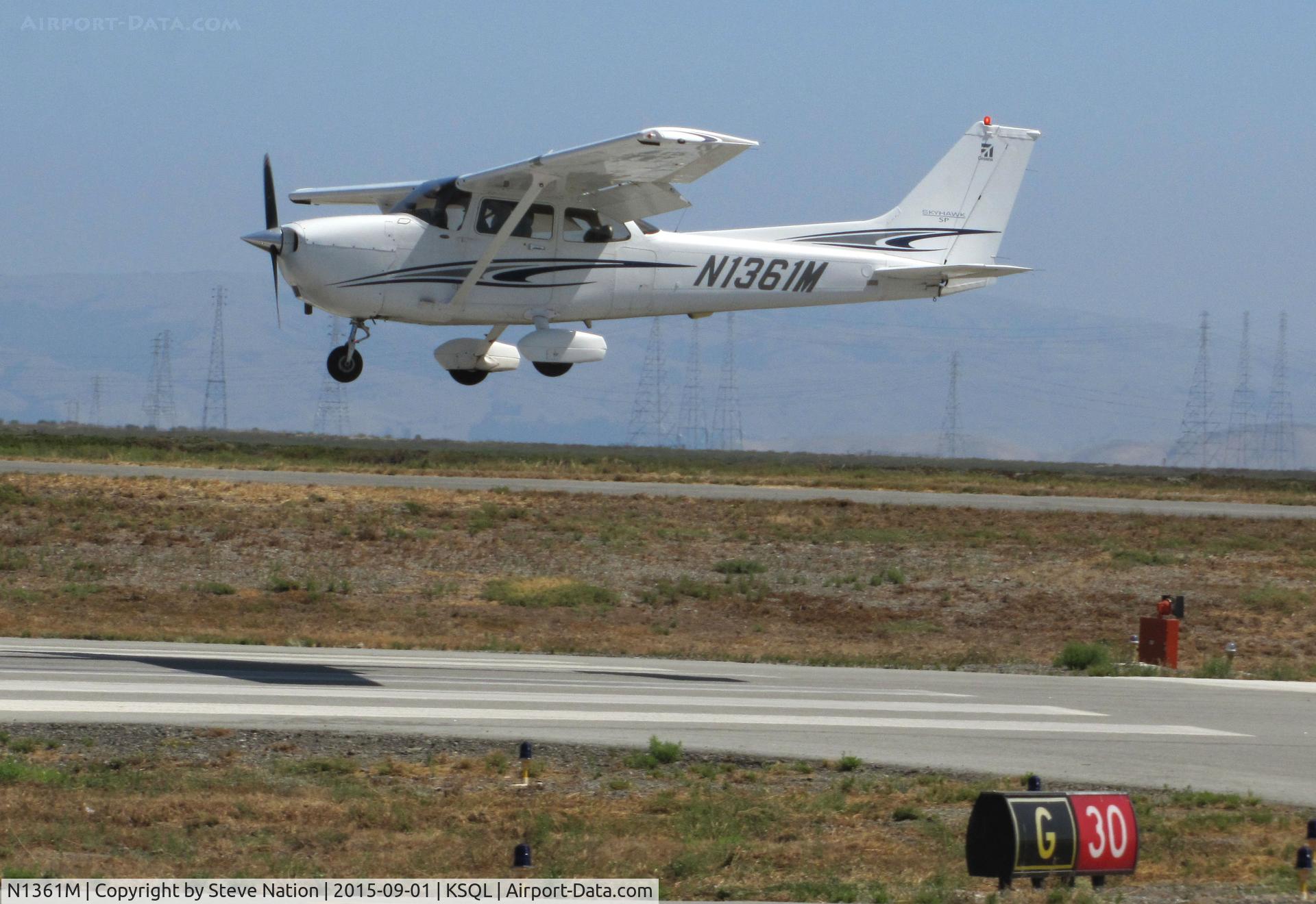 N1361M, 2005 Cessna 172S Skyhawk SP C/N 172S9842, Locally-based 2005 Cessna 172S over the threshold @ San Carlos Airport, CA