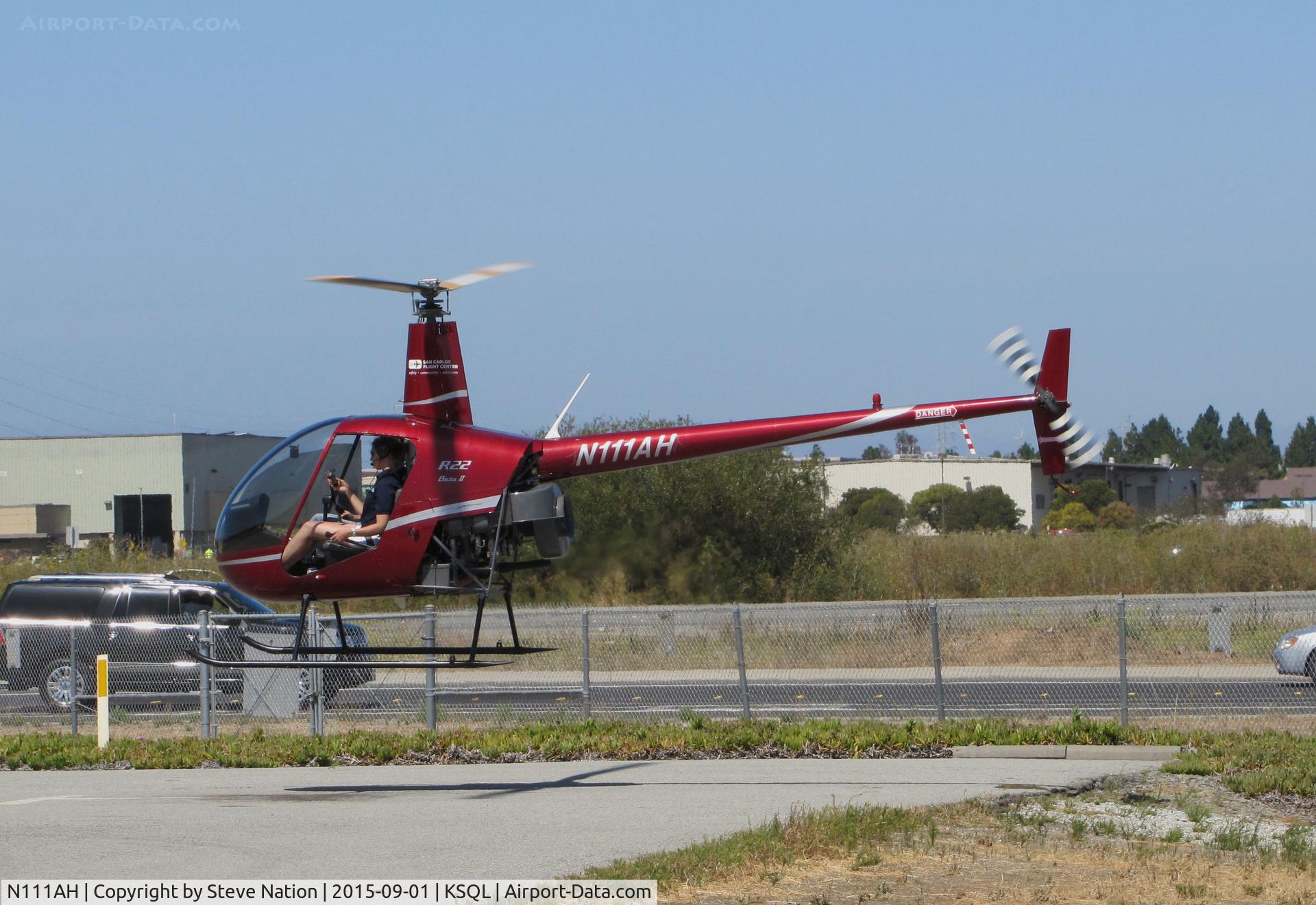 N111AH, 2004 Robinson R22 Beta C/N 3531, San Carlos Flight Center 2004 Robinson R22 BETA hovering at end of training flight @ San Carlos Airport, CA