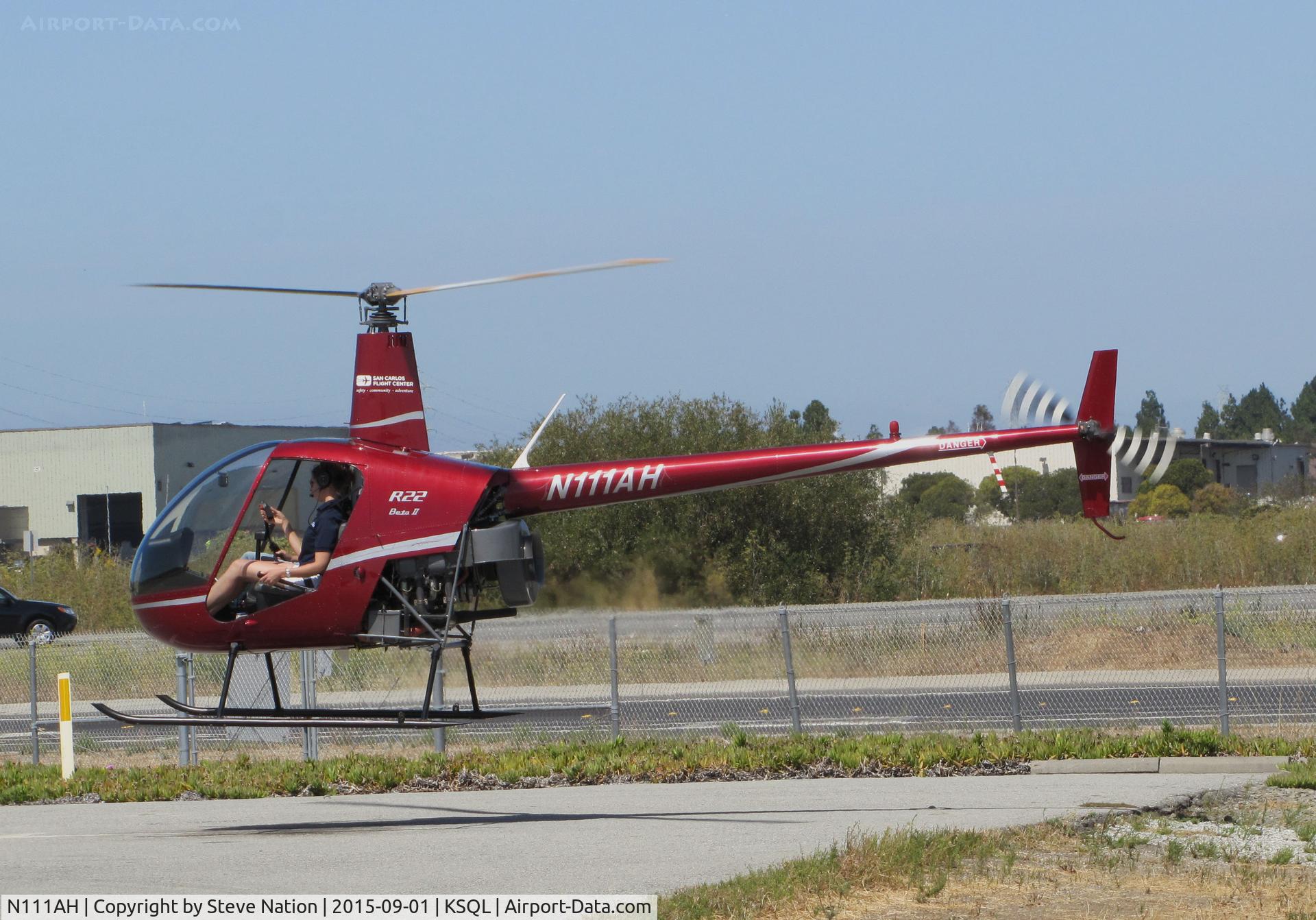 N111AH, 2004 Robinson R22 Beta C/N 3531, San Carlos Flight Center 2004 Robinson R22 BETA hovering at end of training flight @ San Carlos Airport, CA