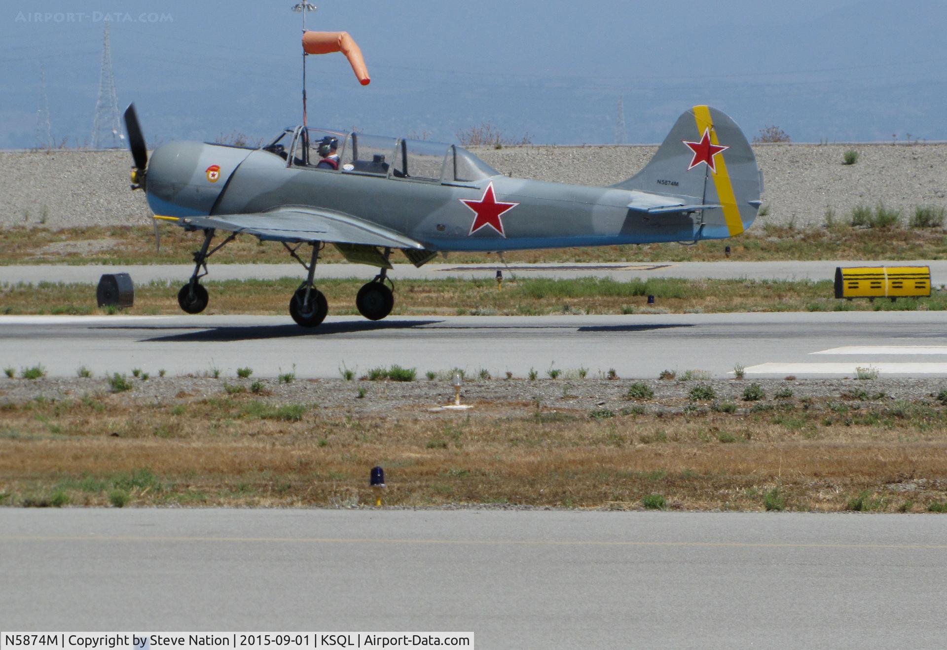 N5874M, 1982 Yakovlev Yak-52 C/N 822302, 1982 YAK-52 warbird touches down @ San Carlos Airport