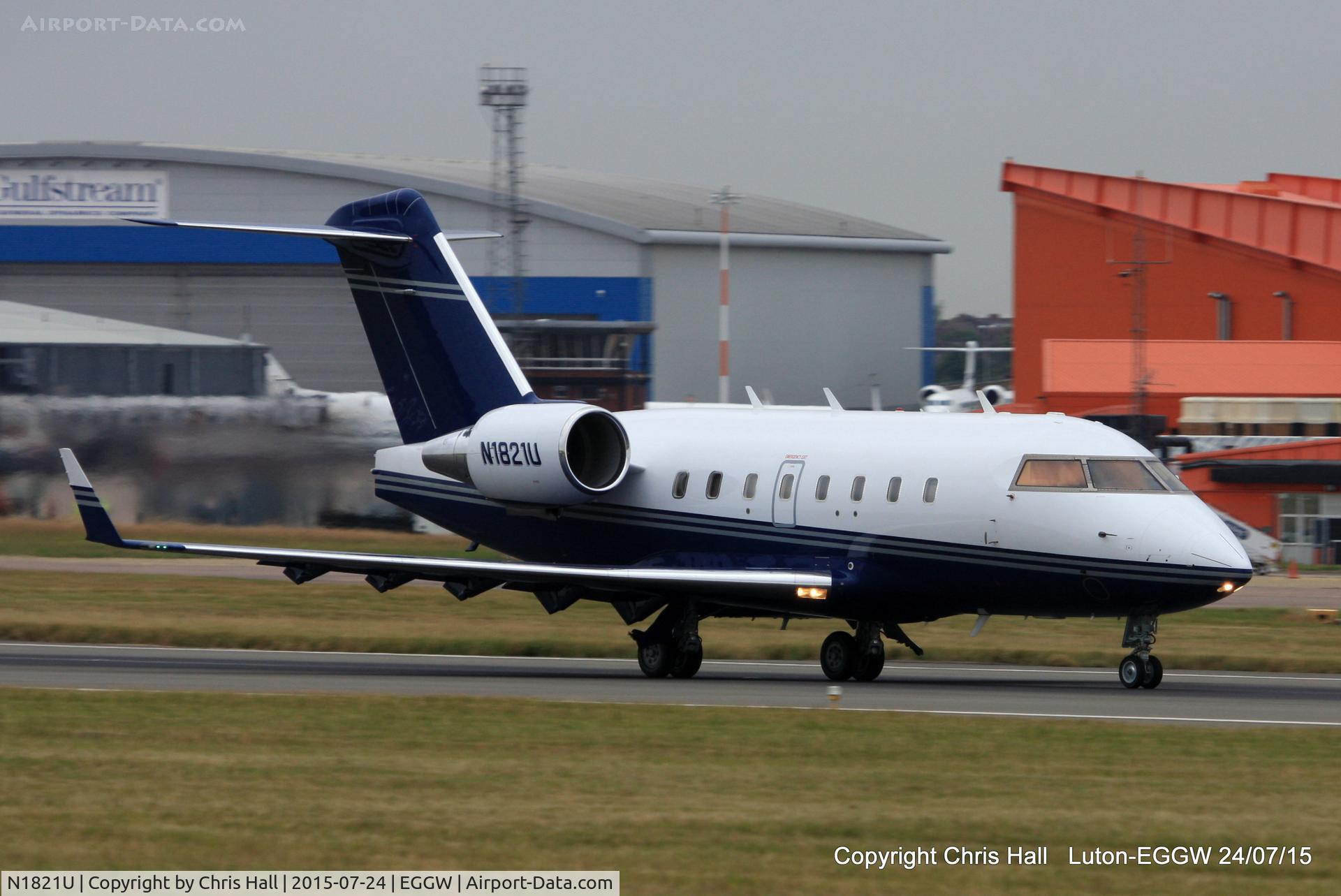 N1821U, 2001 Bombardier Challenger 604 (CL-600-2B16) C/N 5506, departing from Luton