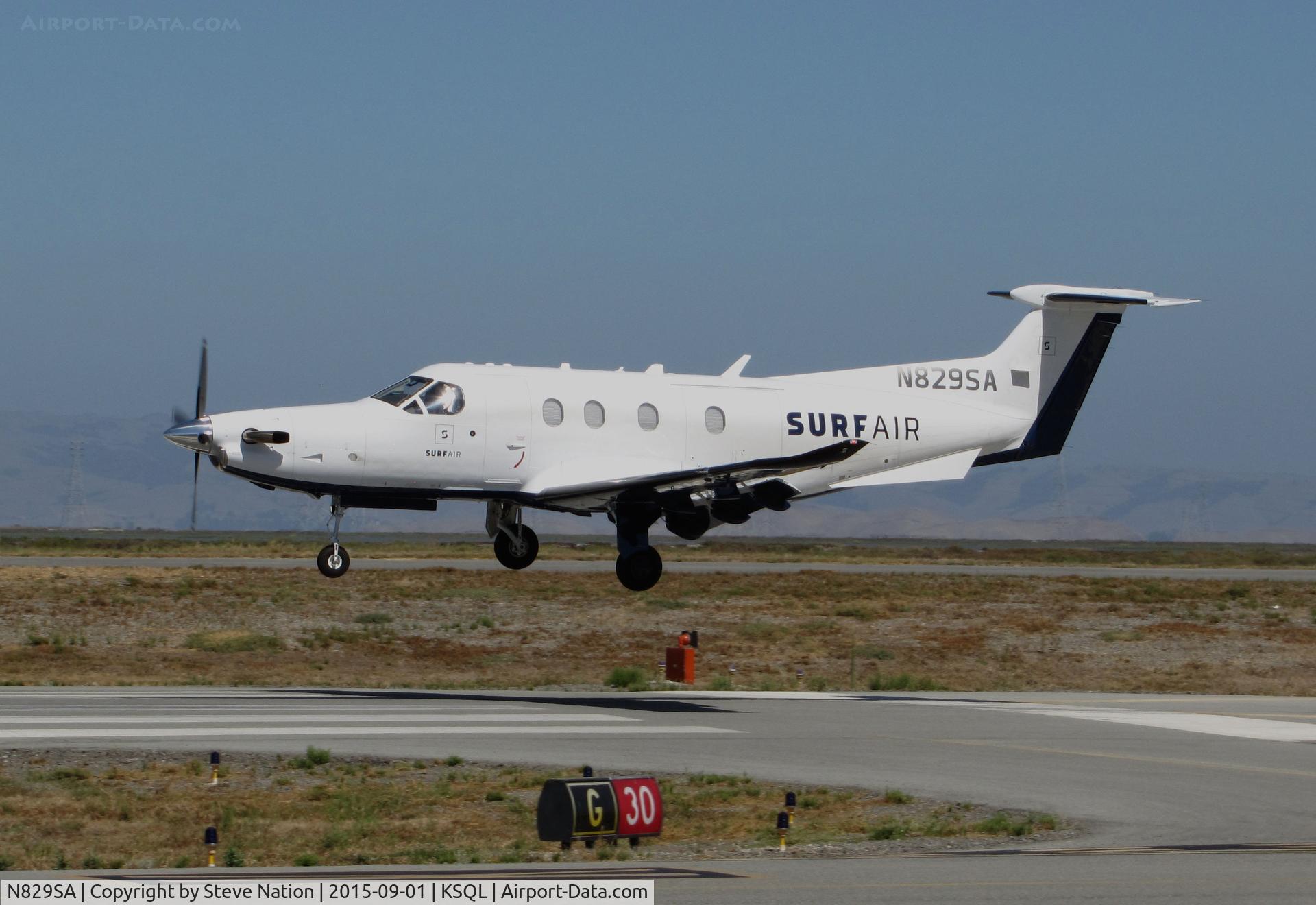 N829SA, 2015 Pilatus PC-12/47E C/N 1533, Surf Airlines PC-12/47E over the threshold at its SF Bay Area operating base (San Carlos Airport) from KSBA (Santa Barbara Municipal Airport)