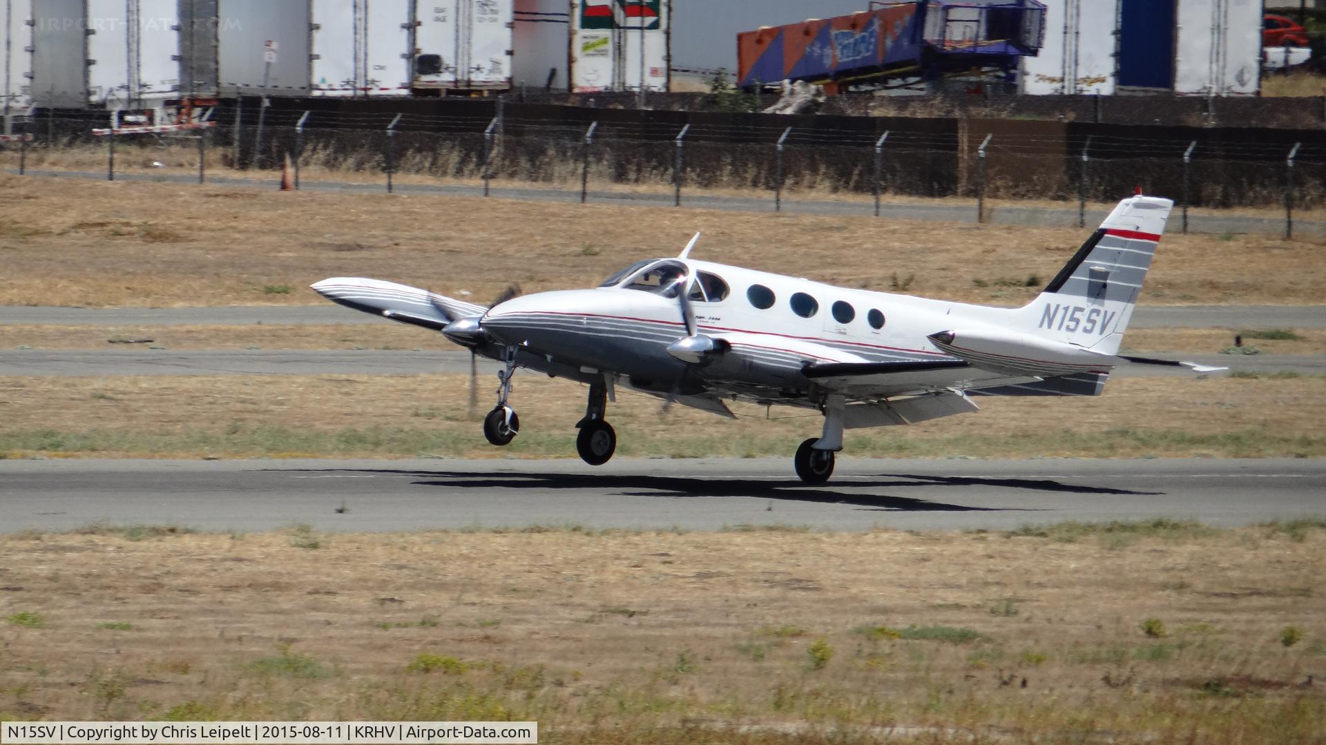 N15SV, 1977 Cessna 340A C/N 340A0226, Locally-based 1977 Cessna 340A landing runway 31R at Reid Hillview Airport, San Jose, CA. Photo taken from the control tower.