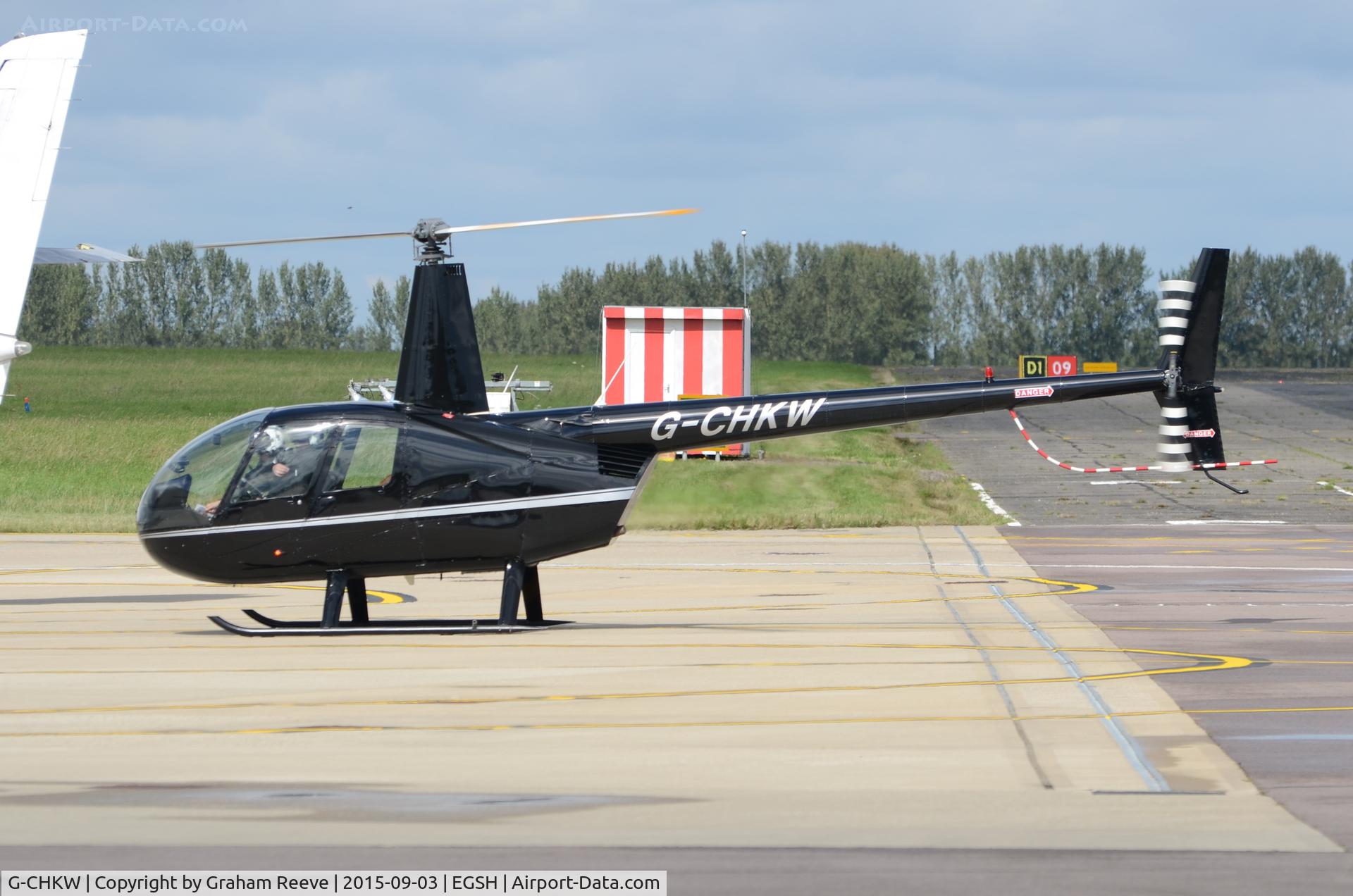 G-CHKW, 2005 Robinson R44 Raven I C/N 1504, On the ground at Norwich.