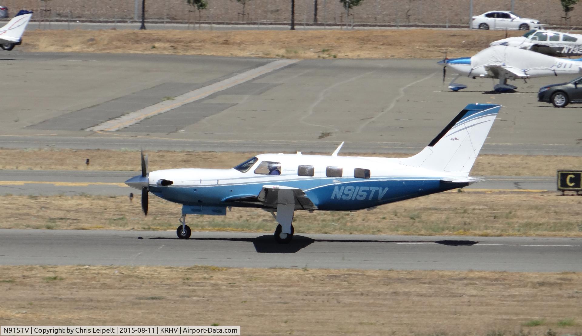 N915TV, 2010 Piper PA-46-500TP Meridan C/N 4697443, Locally-based Piper Meridian (in San Jose Sharks colors) departing runway 31R at Reid Hillview Airport, San Jose, CA. Photo taken from the control tower.