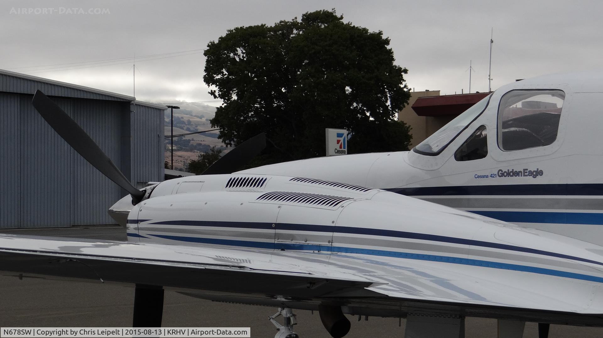 N678SW, Cessna 421C Golden Eagle C/N 421C1023, M E Mullaly Inc (Pacific Grove, CA) 1991 Cessna 421C parked on the transient ramp for an early morning wash at Reid Hillview Airport, San Jose, CA.