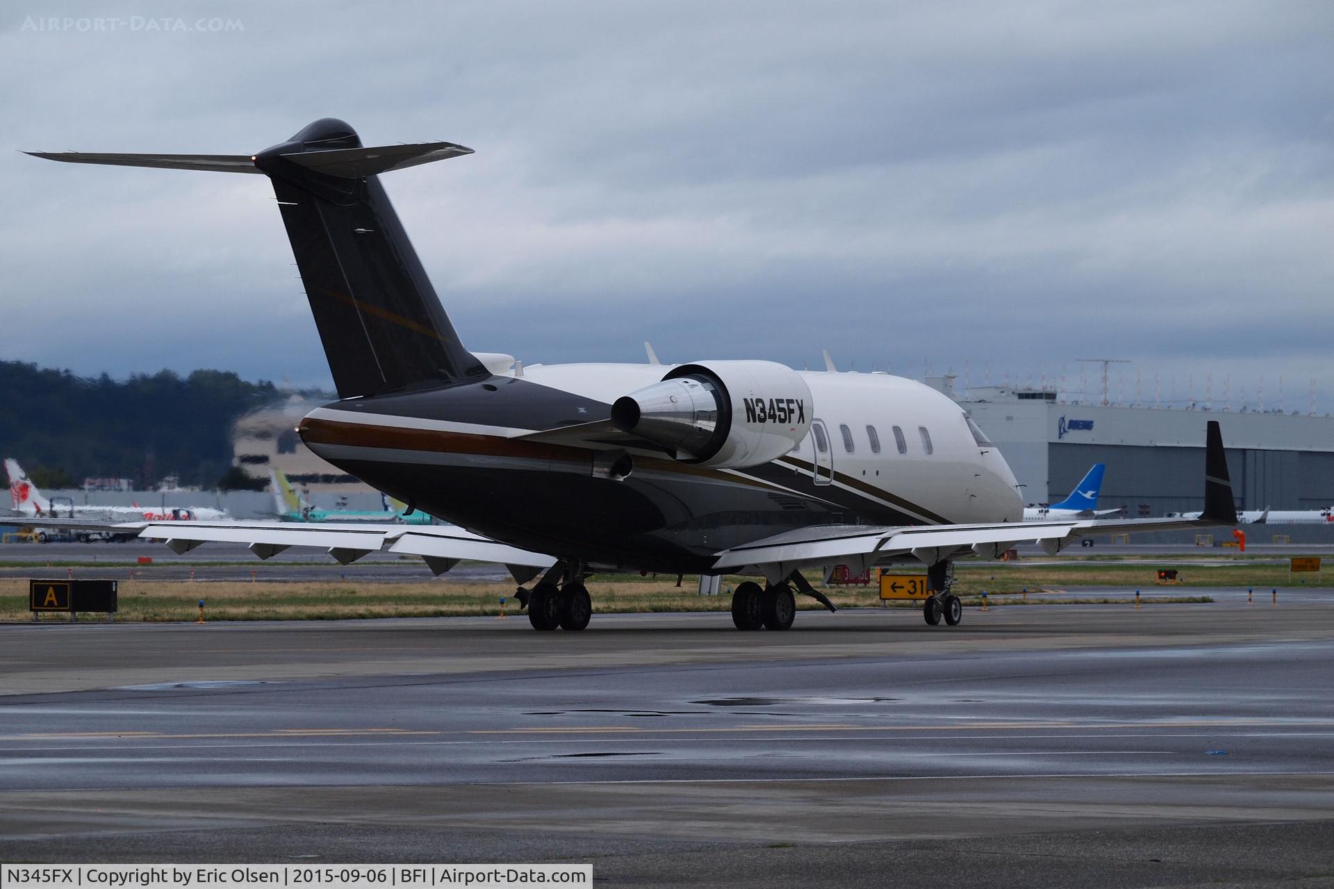 N345FX, 2012 Bombardier Challenger 605 (CL-600-2B16) C/N 5901, 2012 Bombardier taxing at Boeing Field