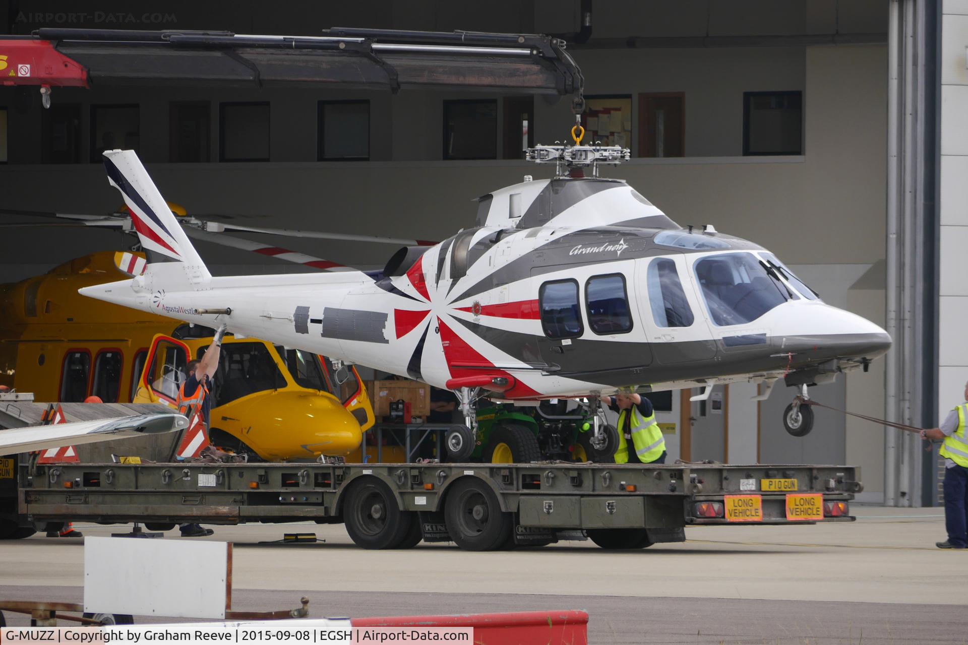 G-MUZZ, 2013 AgustaWestland AW-109SP GrandNew C/N 22325, Being lifted onto a trailer at Norwich.