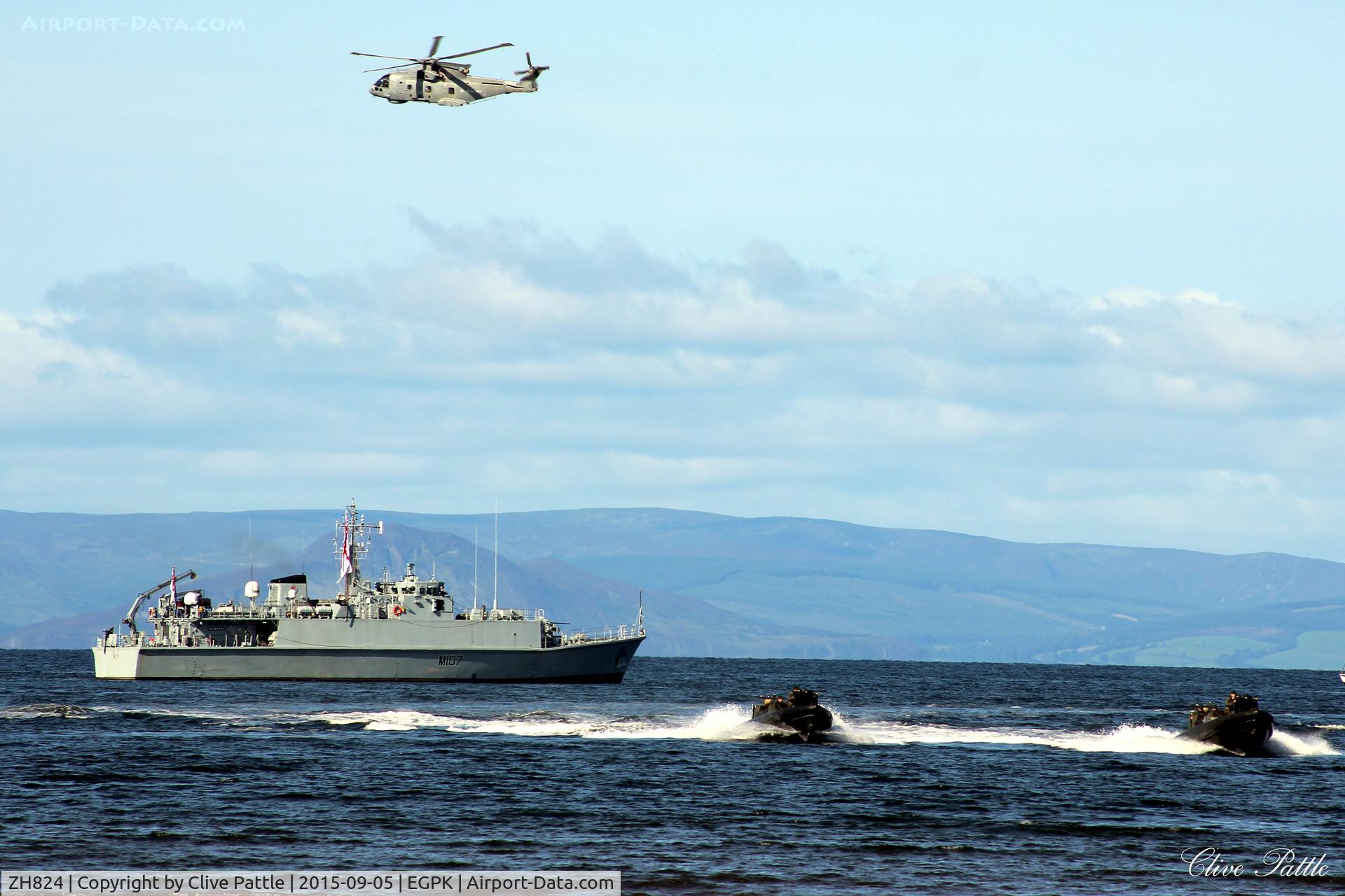 ZH824, 1998 AgustaWestland EH-101 Merlin HM.1 C/N 50021/RN04, In action during a joint RN/RM amphibious assault demonstration at Ayr seafront during the Scottish Airshow 2015 co-located at the nearby Prestwick EGPK. HMS Pembroke in support.
