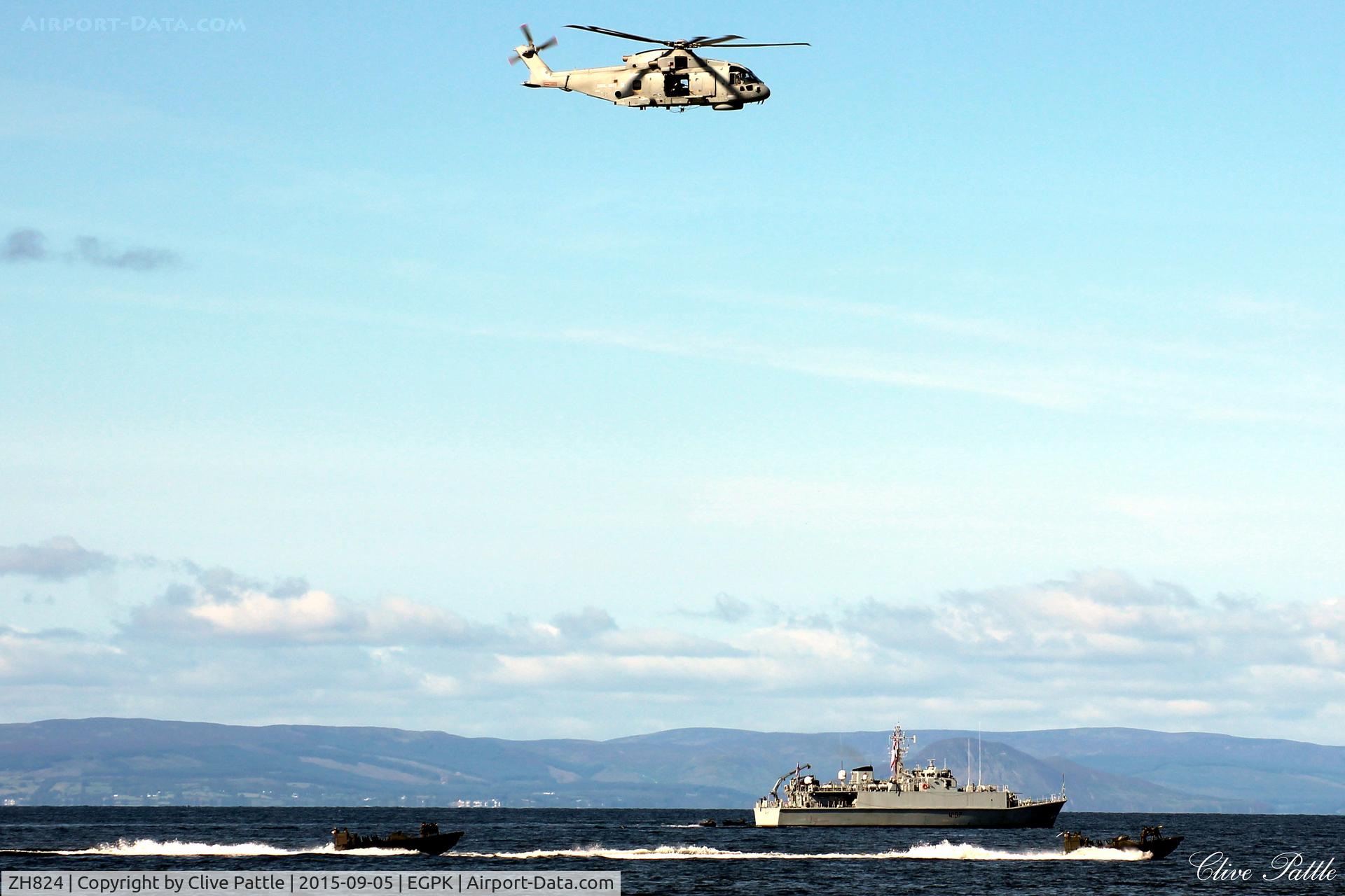 ZH824, 1998 AgustaWestland EH-101 Merlin HM.1 C/N 50021/RN04, In action in a joint RN/RM amphibious assault demonstration at Ayr seafront during the Scottish Airshow 2015 co-located at the nearby Prestwick EGPK. Minesweeper HMS Pembroke in support.