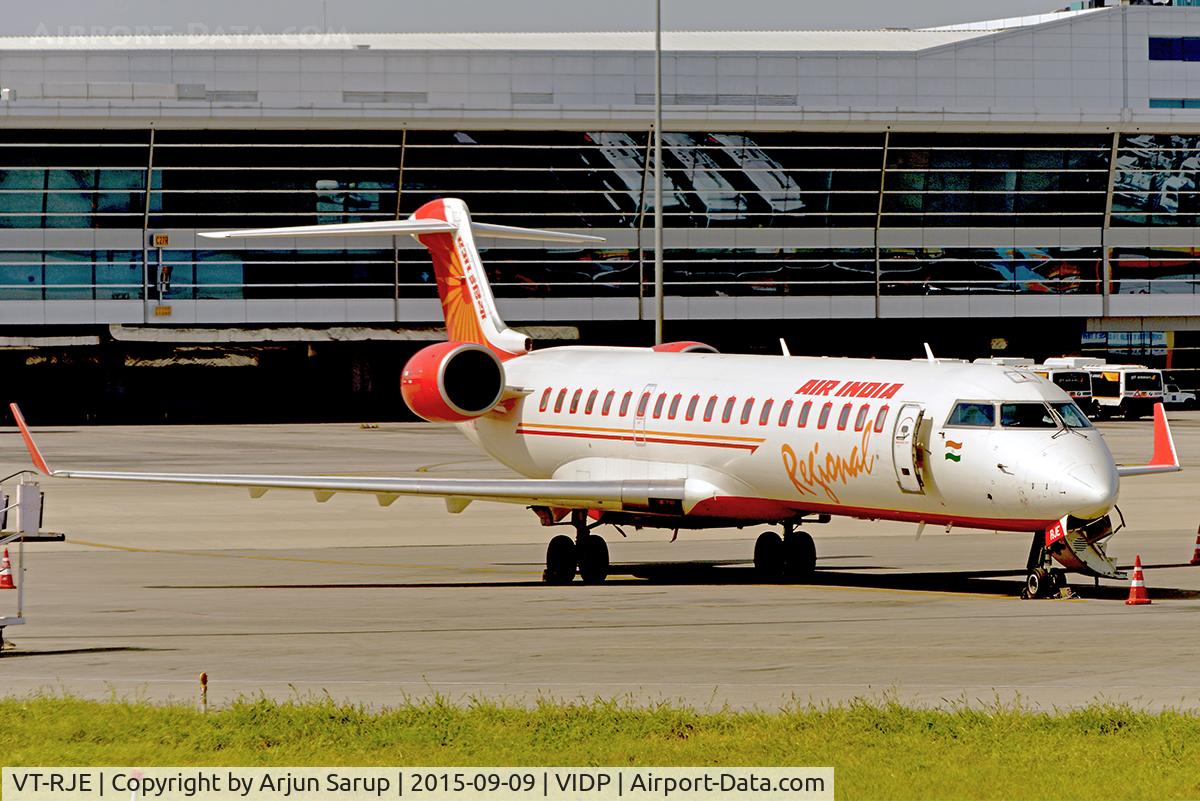 VT-RJE, 2001 Canadair CRJ-700 (CL-600-2C10) Regional Jet C/N 10029, On the tarmac at IGIA T-3.