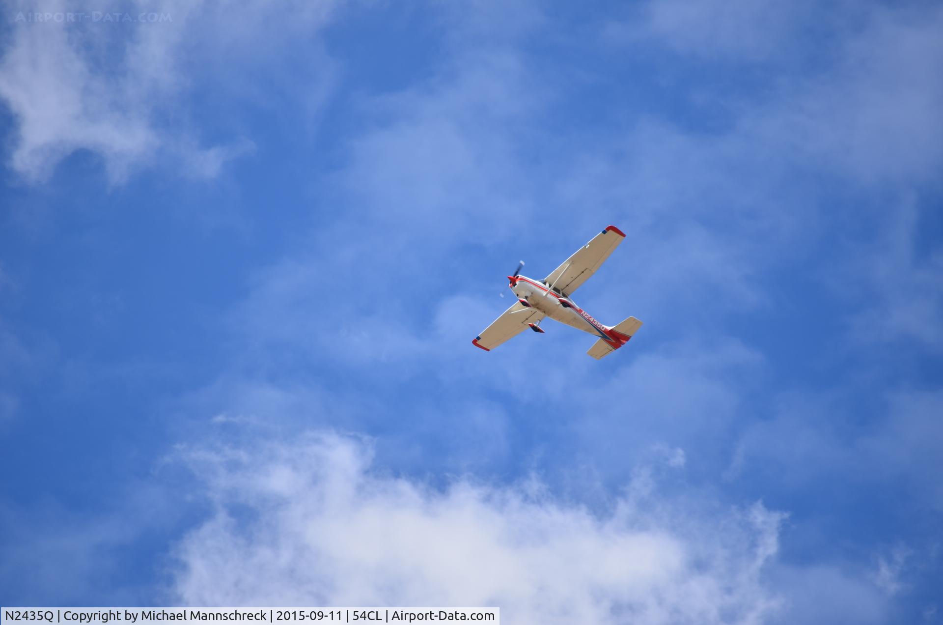 N2435Q, 1966 Cessna 182K Skylane C/N 18257635, Flying low over a House fire circling  the area Low level
