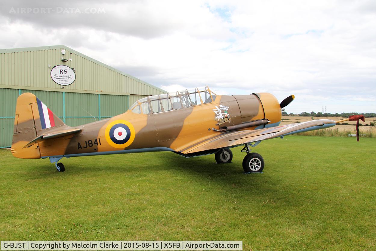 G-BJST, 1953 Canadian Car & Foundry T-6H Harvard Mk.4M C/N 14A-2429, Canadian Car & Foundry T-6H Harvard Mk4M, following a repaint at Fishburn Airfield. August 15th 2015.