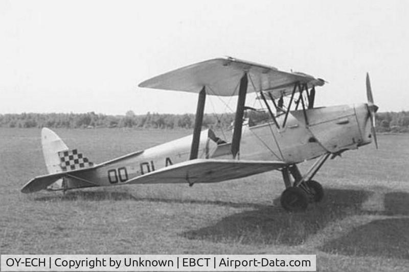 OY-ECH, De Havilland DH-82A Tiger Moth II C/N 85234, Ex OO-DLA  seen a Casteau Belgium in the Mid sixties.
Note, you can see she was equiped for towing glider.
Casteau aerodromes is not existing anymore, the SHAPE is located on his surface.