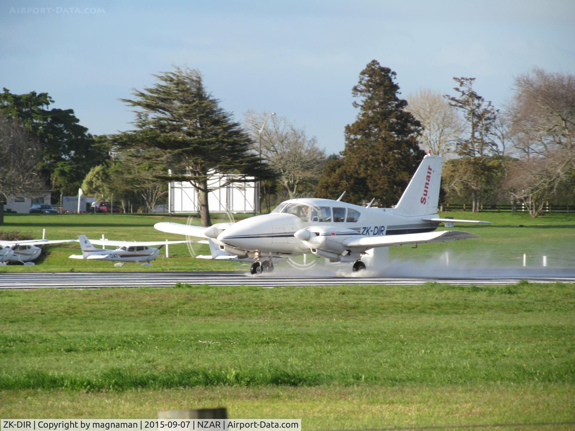 ZK-DIR, Piper PA-23-250 C/N 27-4242, winding up on wet runway