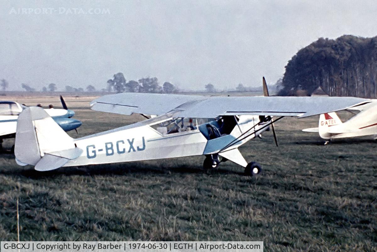 G-BCXJ, 1944 Piper L-4J Grasshopper (J3C-65D) C/N 13048, Piper L-4J Grasshopper [13048] Old Warden~G 30/06/1974. From a slide.