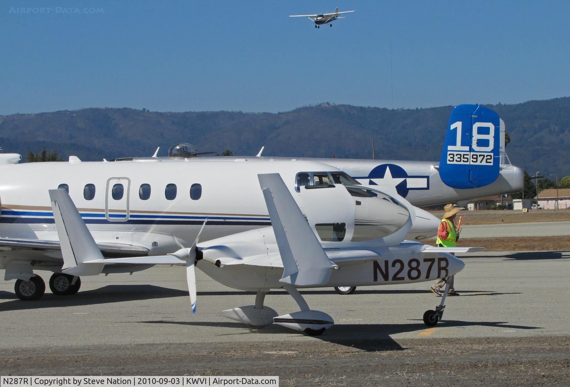 N287R, 2005 Co-Z Cozy Mark IV C/N 400, Busy time @ 2010 Watsonville Fly-in with Rose COZY MARK IV N287R taxing, Hawker 800XP N427TM and Commemorative Air Force TB-25N N125AZ in background, and Cessna 172P N9389L on final approach