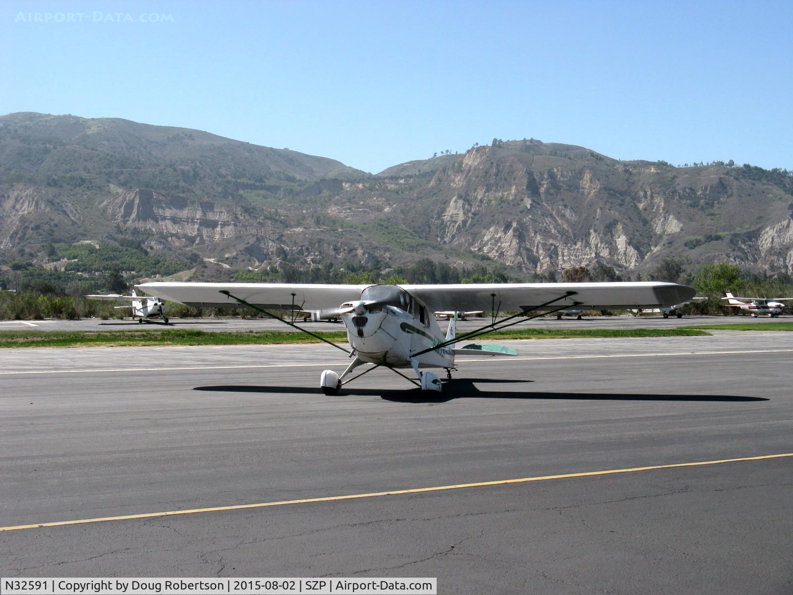 N32591, 1940 Piper J4A C/N 4-1284, 1940 Piper J4A CUB COUPE, Continental A&C75 75 Hp upgrade, taxi off the active