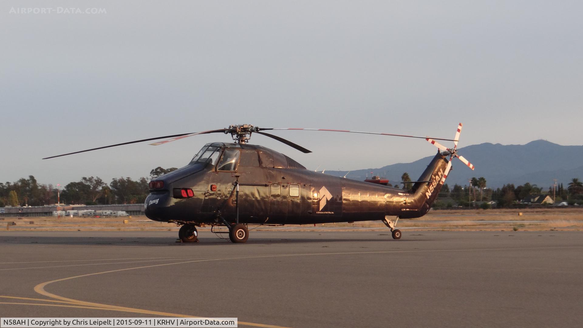 N58AH, 1956 Sikorsky S-58ET C/N 58-328, Very interesting 1956 Sikorsky S-58ET sitting on the transient ramp at Reid Hillview Airport, San Jose, CA. I've been told it has been here before, but this is my first time seeing in here. Someone from Nice Air works on it.