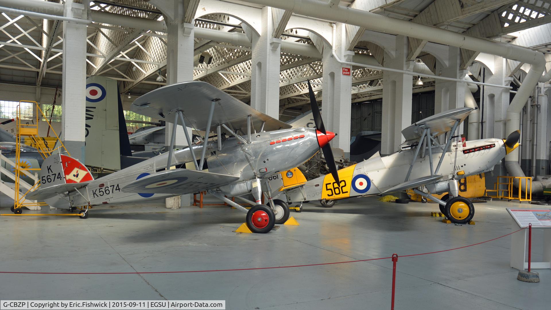 G-CBZP, 1935 Hawker Fury 1 C/N 41H-67550, 5. The Fury in company with the Nimrod at The Imperial War Museum, Duxford, Cambridgeshire.