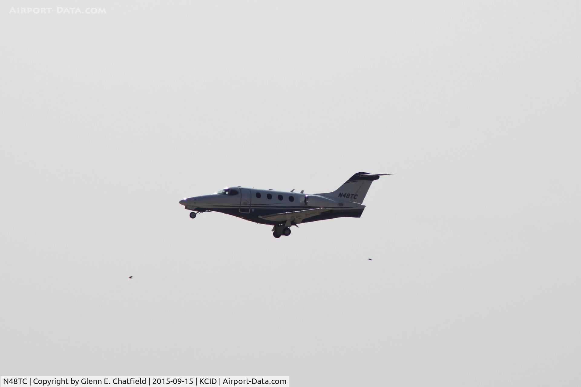 N48TC, Raytheon Aircraft Company 390 C/N RB-13, Departing runway 13, looking into the sun