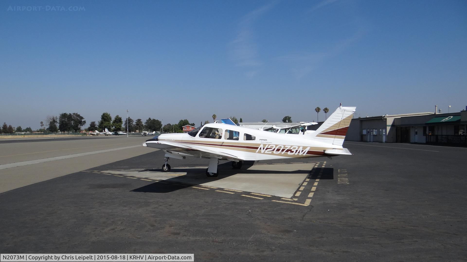 N2073M, Piper PA-28R-201 Cherokee Arrow III C/N 28R-7837065, Oregon-based Piper PA-28R-201 parked on the Nice Air helipad at Reid Hillview Airport, San Jose, CA.