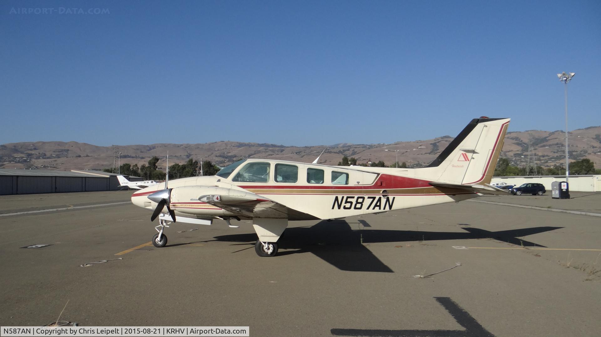 N587AN, Beechcraft 58 Baron C/N TH-1530, Locally-based Beechcraft Baron 58 sitting at the south tie downs at Reid Hillview Airport, San Jose, CA while the Nice Air ramp gets resurfaced. This is the busiest you will ever see the south tie downs since (as of this date) there are only 11 a/c there.