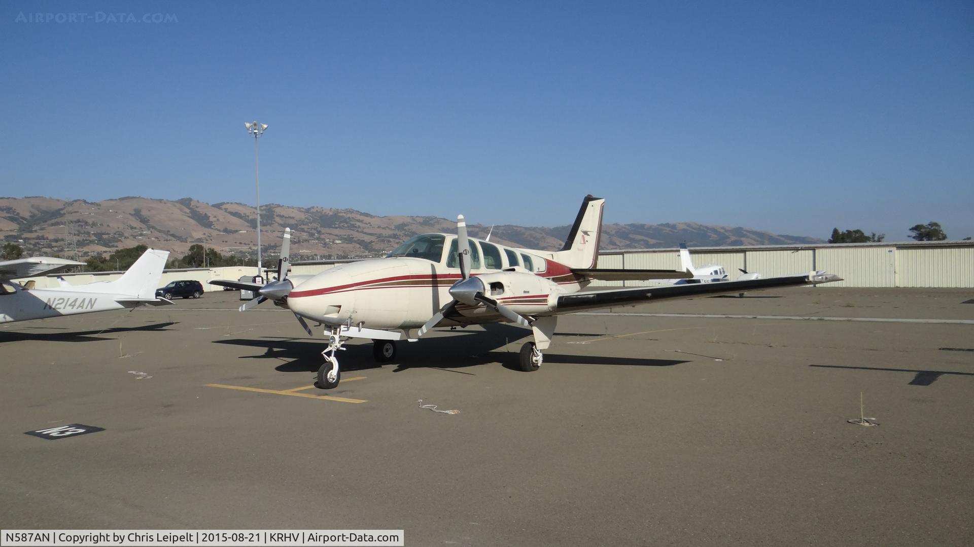 N587AN, Beechcraft 58 Baron C/N TH-1530, Locally-based Beechcraft Baron 58 sitting at the south tie downs at Reid Hillview Airport, San Jose, CA while the Nice Air ramp gets resurfaced. This is the busiest you will ever see the south tie downs since (as of this date) there are only 11 a/c there.