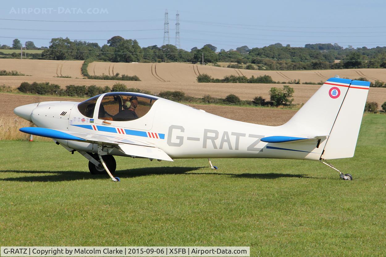 G-RATZ, 1997 Europa Monowheel C/N PFA 247-12582, Europa Monowheel. A long term airfield resident, taxis to her hangar on return from the 2015 LAA Sywell Rally. Fishburn Airfield, September 6th 2015.