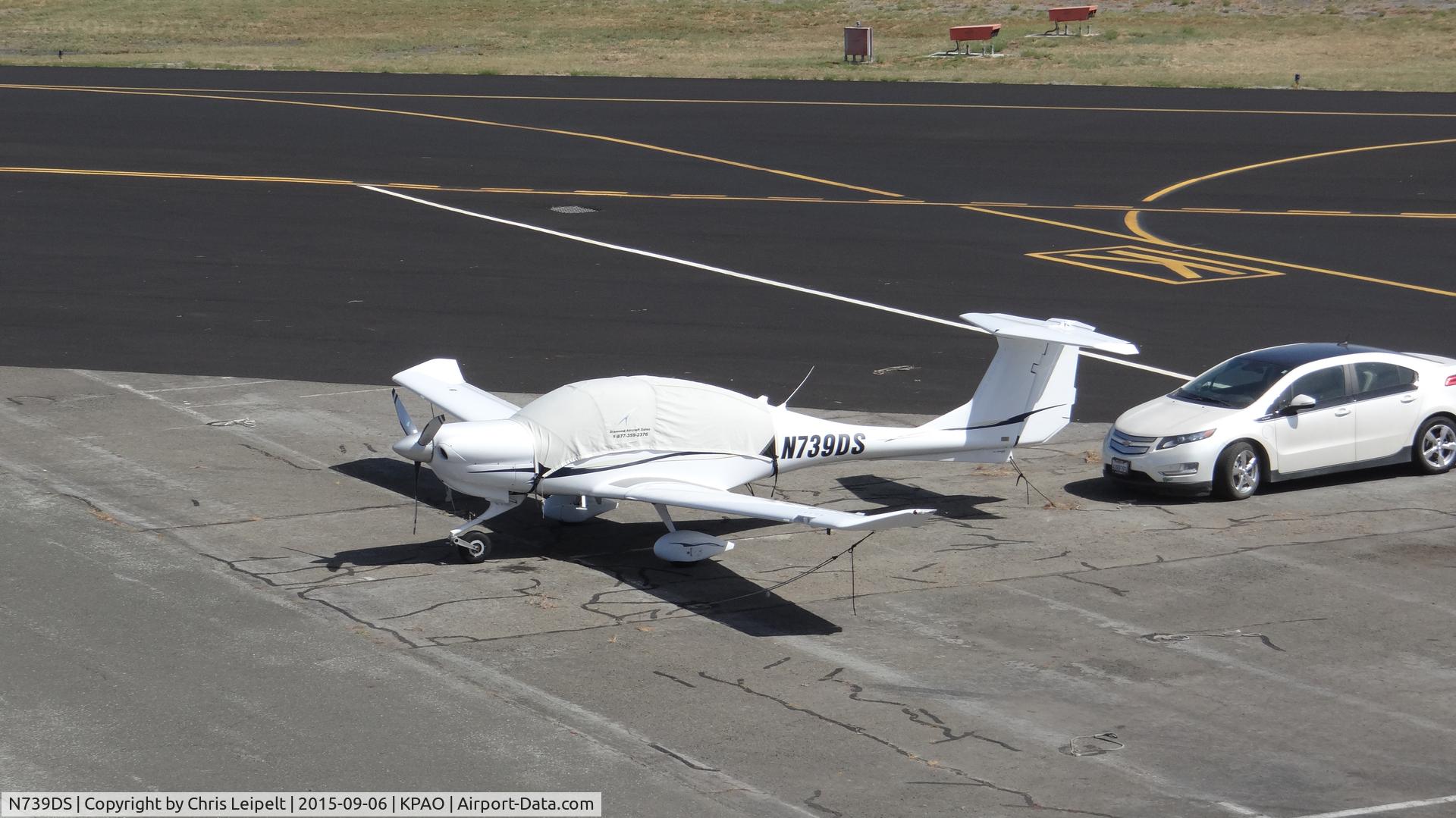N739DS, 2006 Diamond DA-40 Diamond Star C/N 40.739, Diamond Dynamics LLC (Geyserville, CA) 2006 Diamond DA-40 parked at its tie down at Palo Alto Airport, Palo Alto, CA. Photo taken from the control tower.