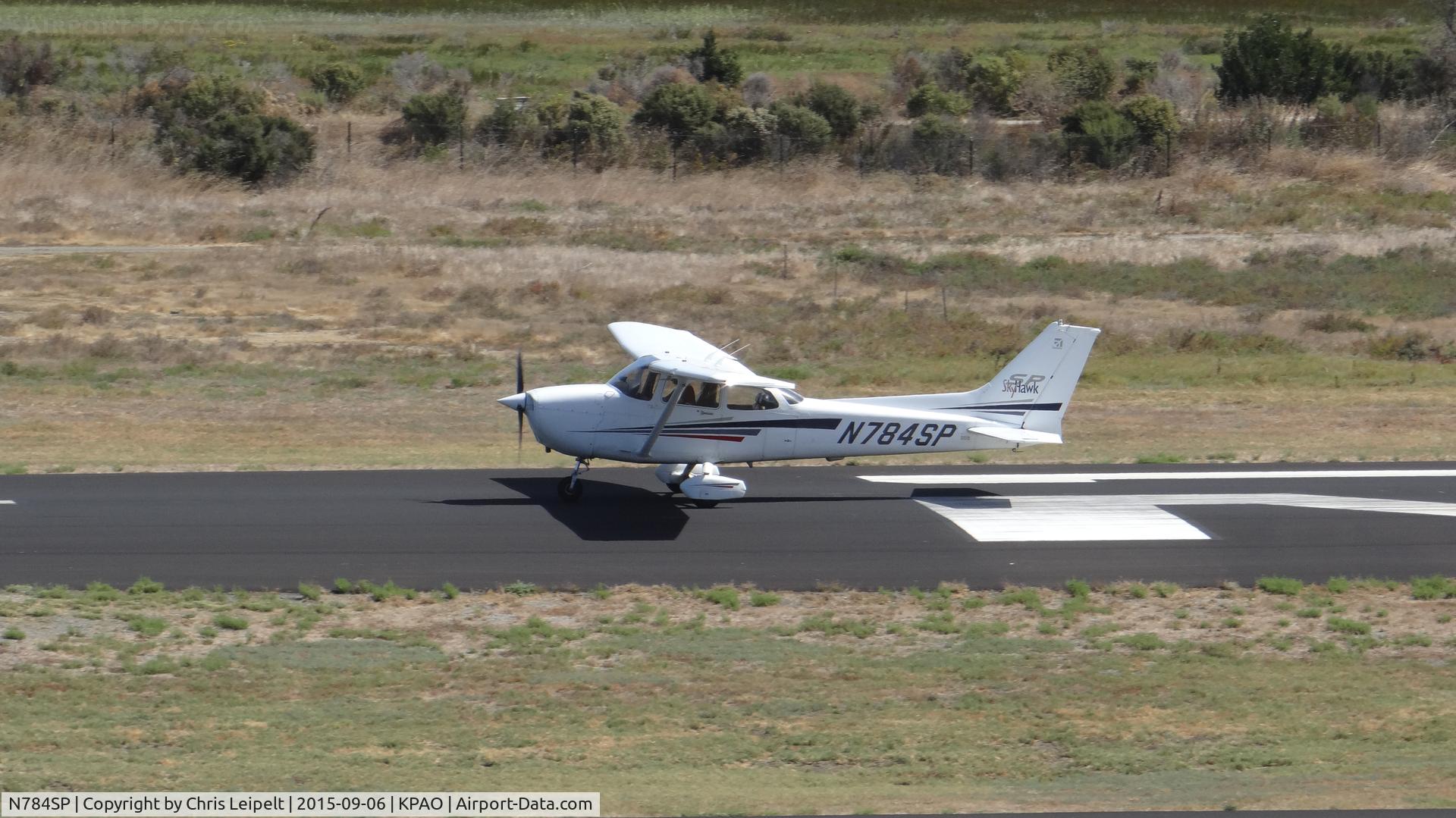 N784SP, 2001 Cessna 172S C/N 172S8711, Locally-based 2001 Cessna 172S rolling down runway 31 for departure at Palo Alto Airport, Palo Alto, CA. Photo taken from the control tower.