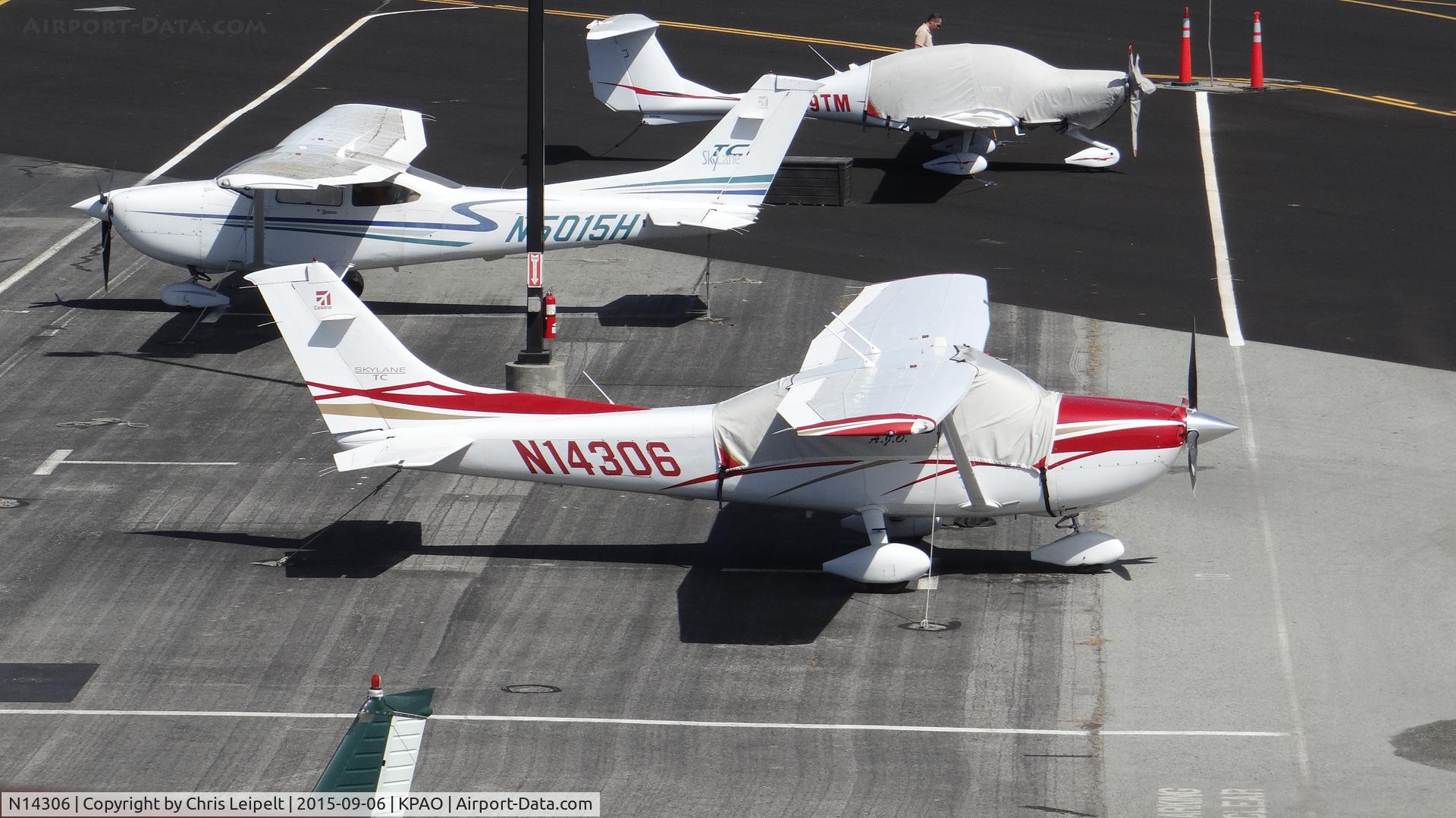 N14306, 2007 Cessna T182T Turbo Skylane C/N T18208681, Locally-based 2007 Cessna T182T sitting at its tie down at Palo Alto Airport, Palo Alto, CA. Photo taken from the control tower.