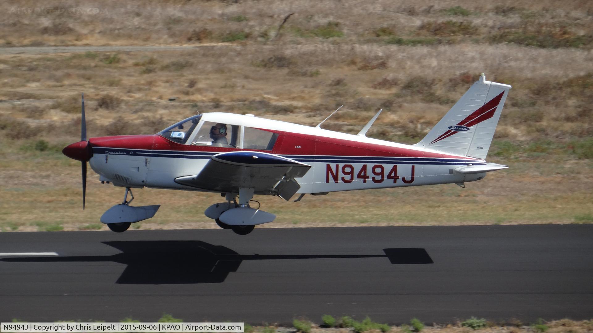 N9494J, Piper PA-28-180 C/N 28-3613, Locally-based Piper PA-28-180 landing on runway 31 at Palo Alto Airport, Palo Alto, CA. Photo taken from the control tower.