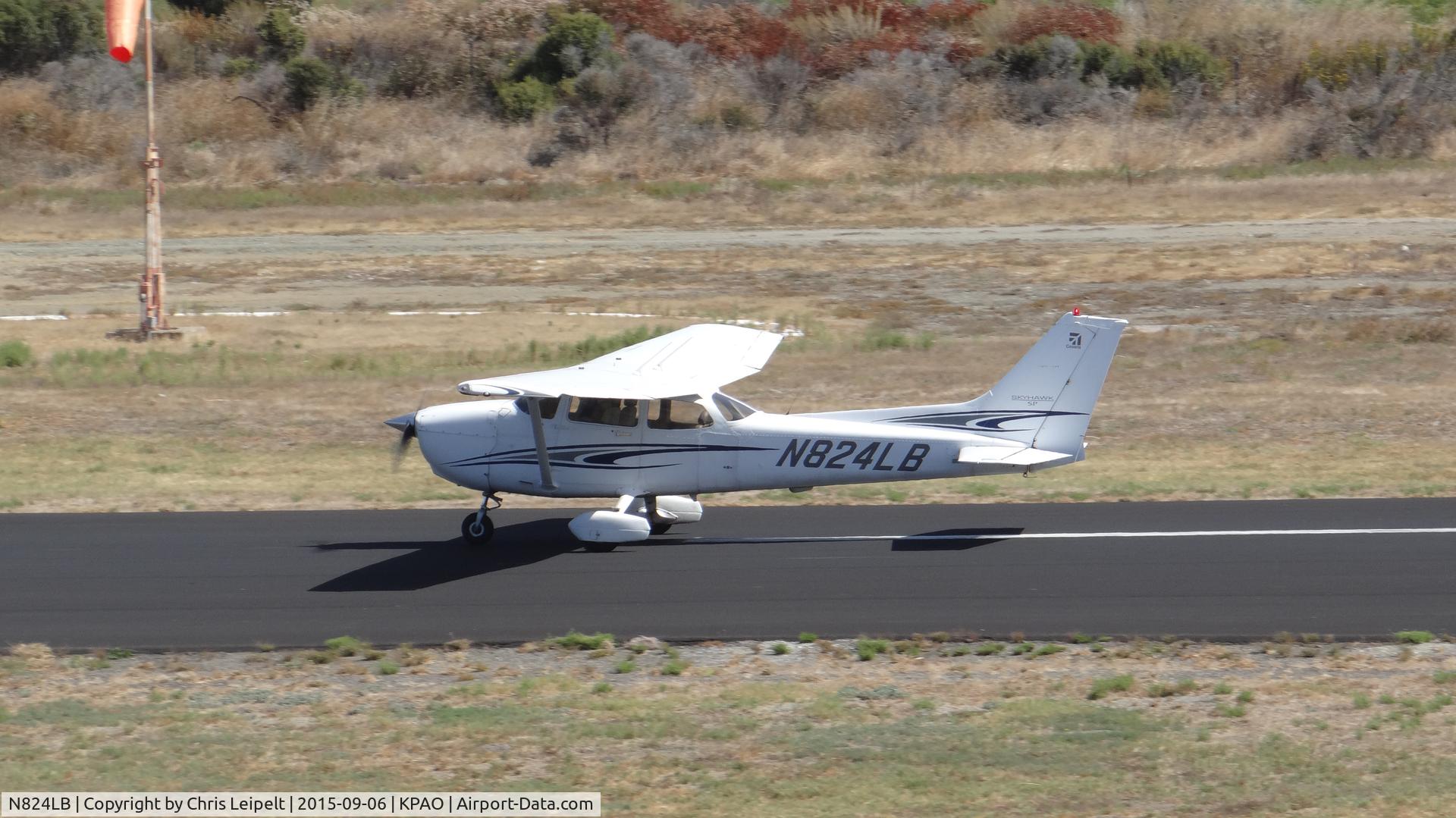 N824LB, 2005 Cessna 172S C/N 172S9824, Reid Hillview-based 2005 Cessna 172S landing runway 31 at Palo Alto Airport, Palo Alto, CA. Photo taken from the control tower.