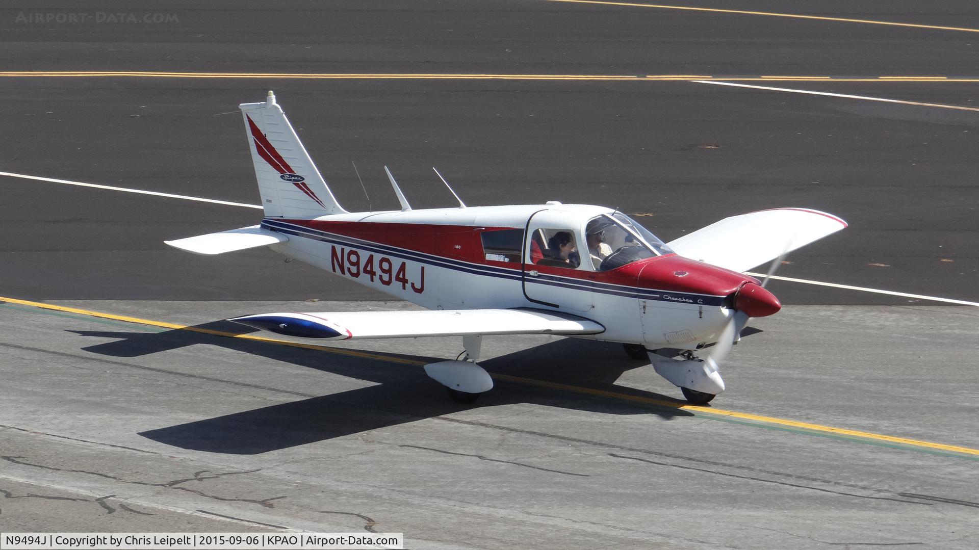 N9494J, Piper PA-28-180 C/N 28-3613, Locally-based Piper PA-28-180 taxing to its tie down at Palo Alto Airport, Palo Alto, CA. Photo taken from the control tower.