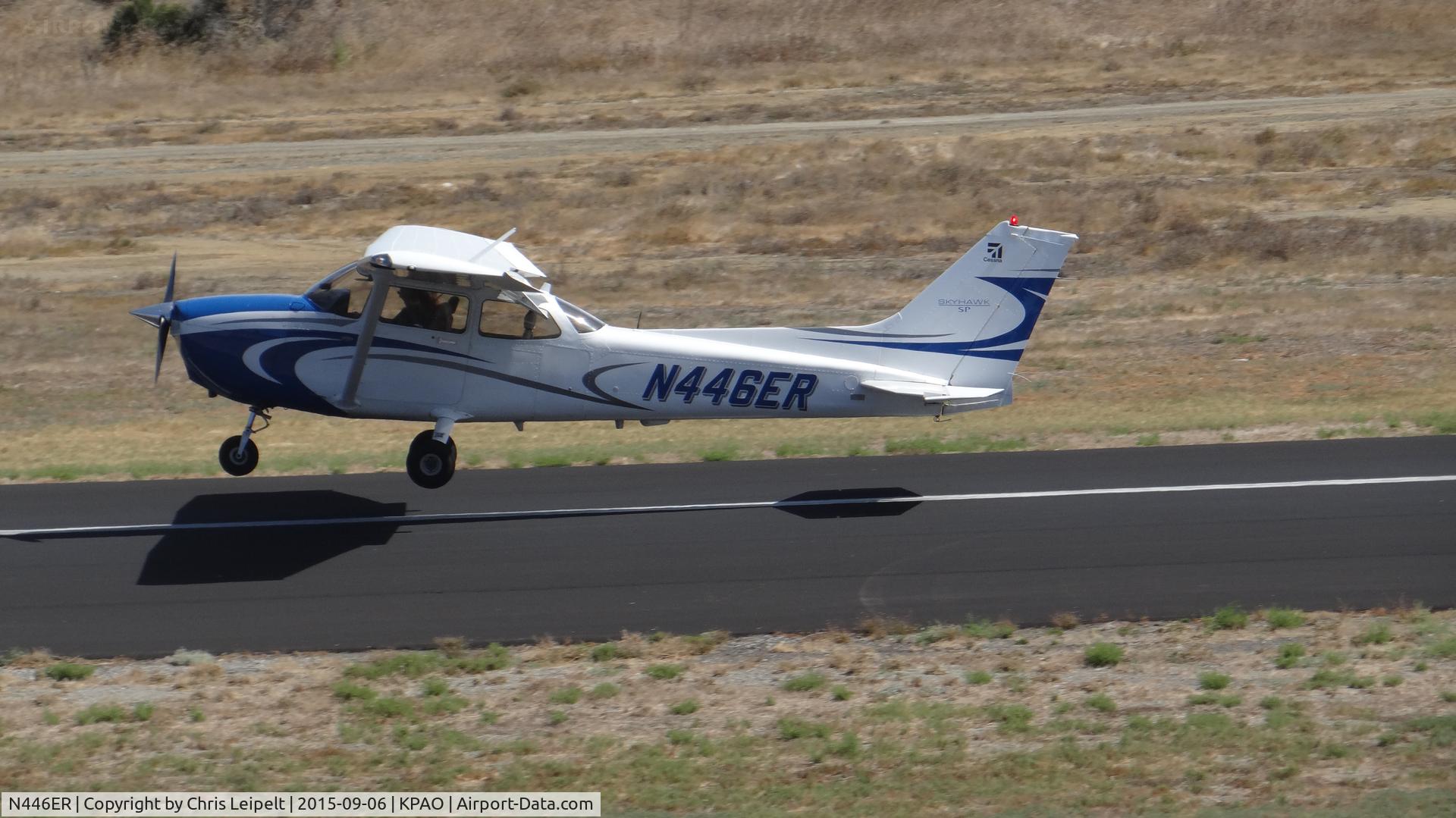 N446ER, 2006 Cessna 172S C/N 172S10220, Locally-based 2006 Cessna 172S departing runway 31 at Palo Alto Airport, Palo Alto, CA. Photo taken from the control tower.