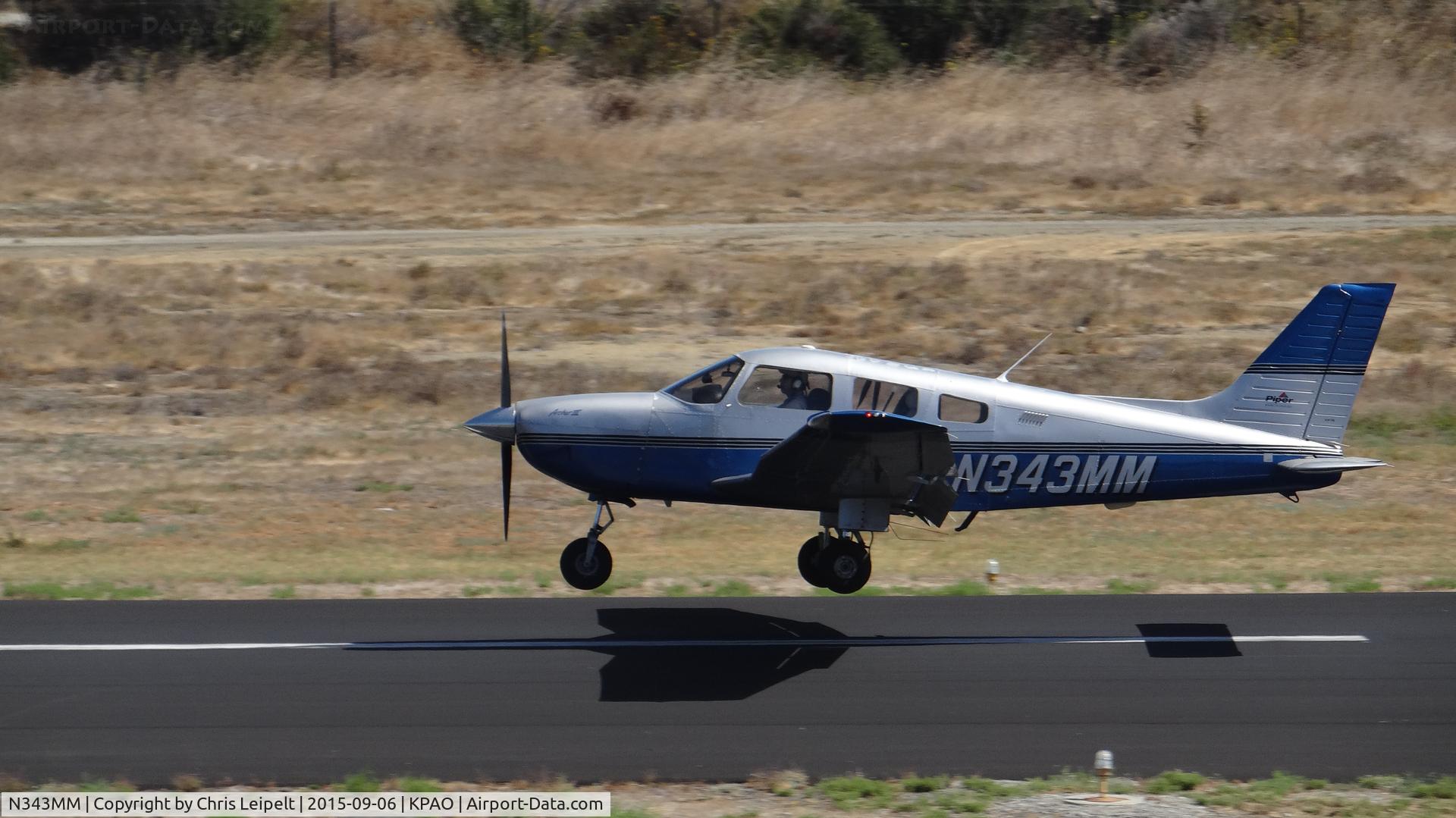 N343MM, 1999 Piper PA-28-181 C/N 28-43266, Locally-based 1999 Piper PA-28-181 landing runway 31 at Palo Alto Airport, Palo Alto, CA. Photo taken from the control tower.