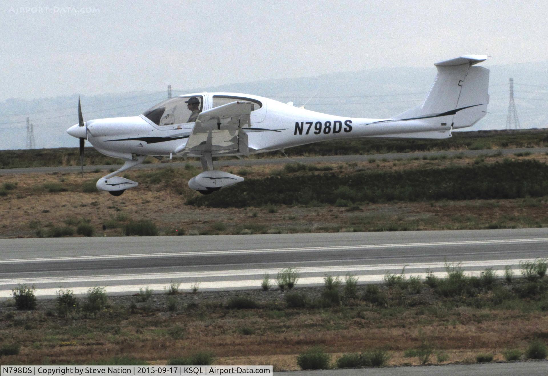 N798DS, 2007 Diamond DA-40 Diamond Star C/N 40.798, Locally-Based 2007 Diamond DA-40 over threshold on overcast morning @ San Carlos Municipal Airport, CA