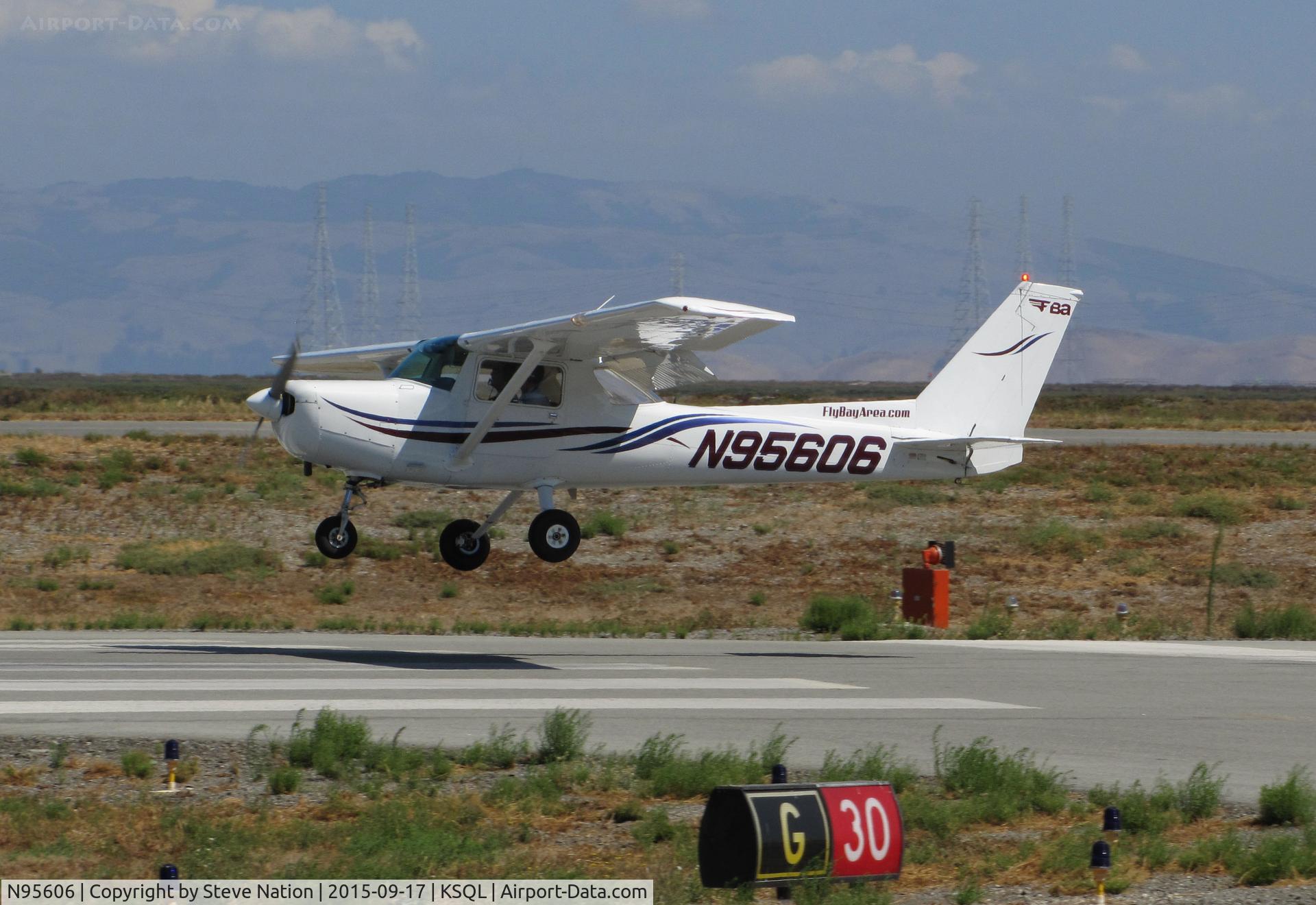 N95606, 1984 Cessna 152 C/N 15285936, Locally-=Based FlyBayArea.com 1984 Cessna 152 over the threshold @ San Carlos Municipal Airport, CA