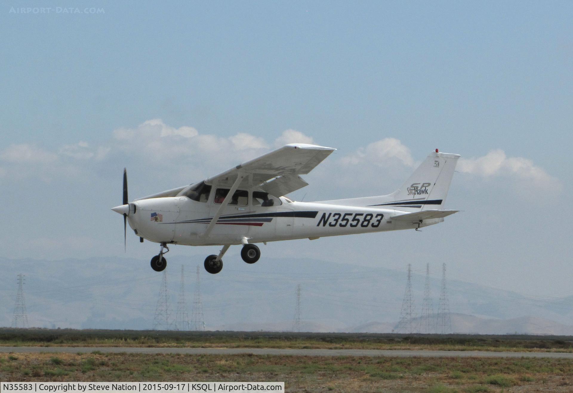 N35583, Cessna 172S C/N 172S8872, Locally-Based 2001 Cessna 172S over the threshold @ San Carlos Municipal Airport, CA