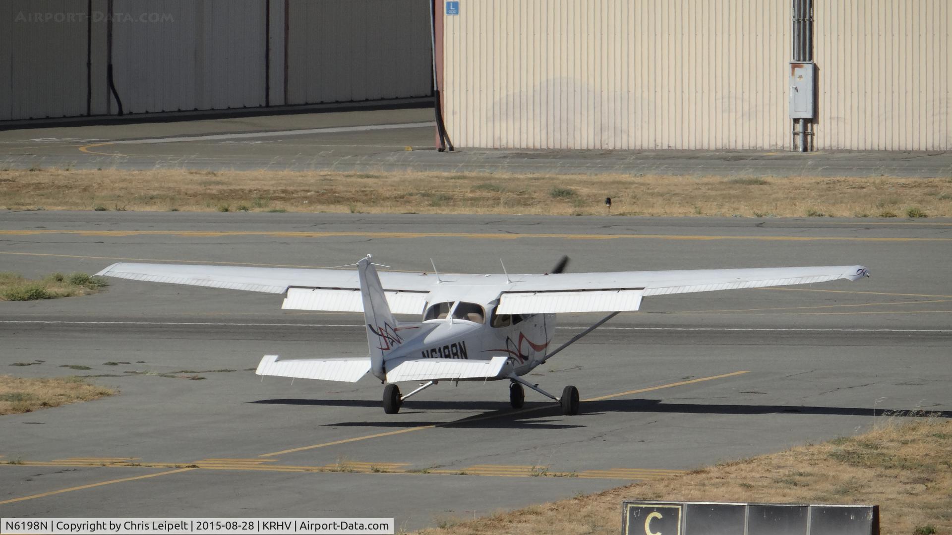 N6198N, 2008 Cessna 172S C/N 172S10792, Christiansen Aviation Inc (San Carlos, CA) 2008 Cessna 172S clear of 31L taxing back to more patterns at Reid Hillview Airport, San Jose, CA.