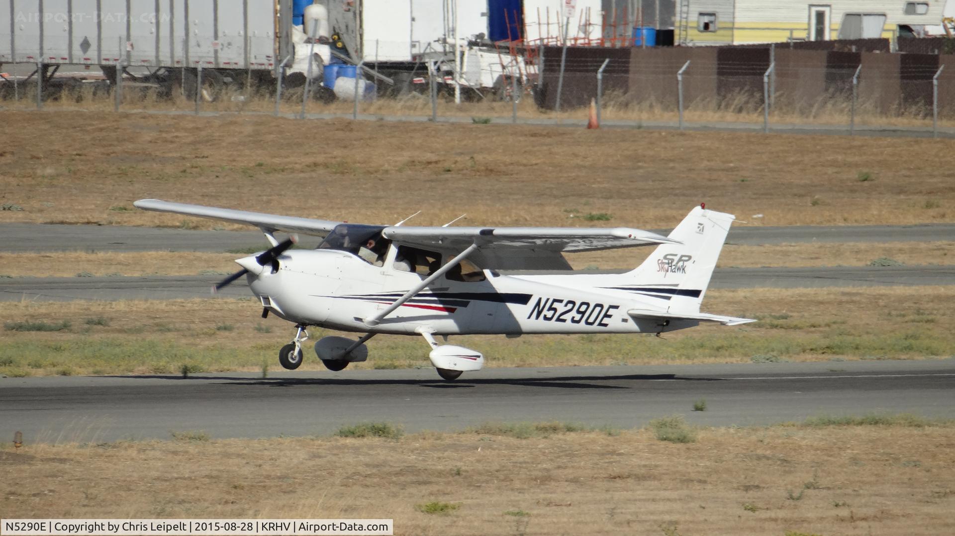 N5290E, 2002 Cessna 172S C/N 172S9226, Locally-based 2002 Cessna 172S landing runway 31L at Reid Hillview Airport, San Jose, CA. Photo taken from the control tower.