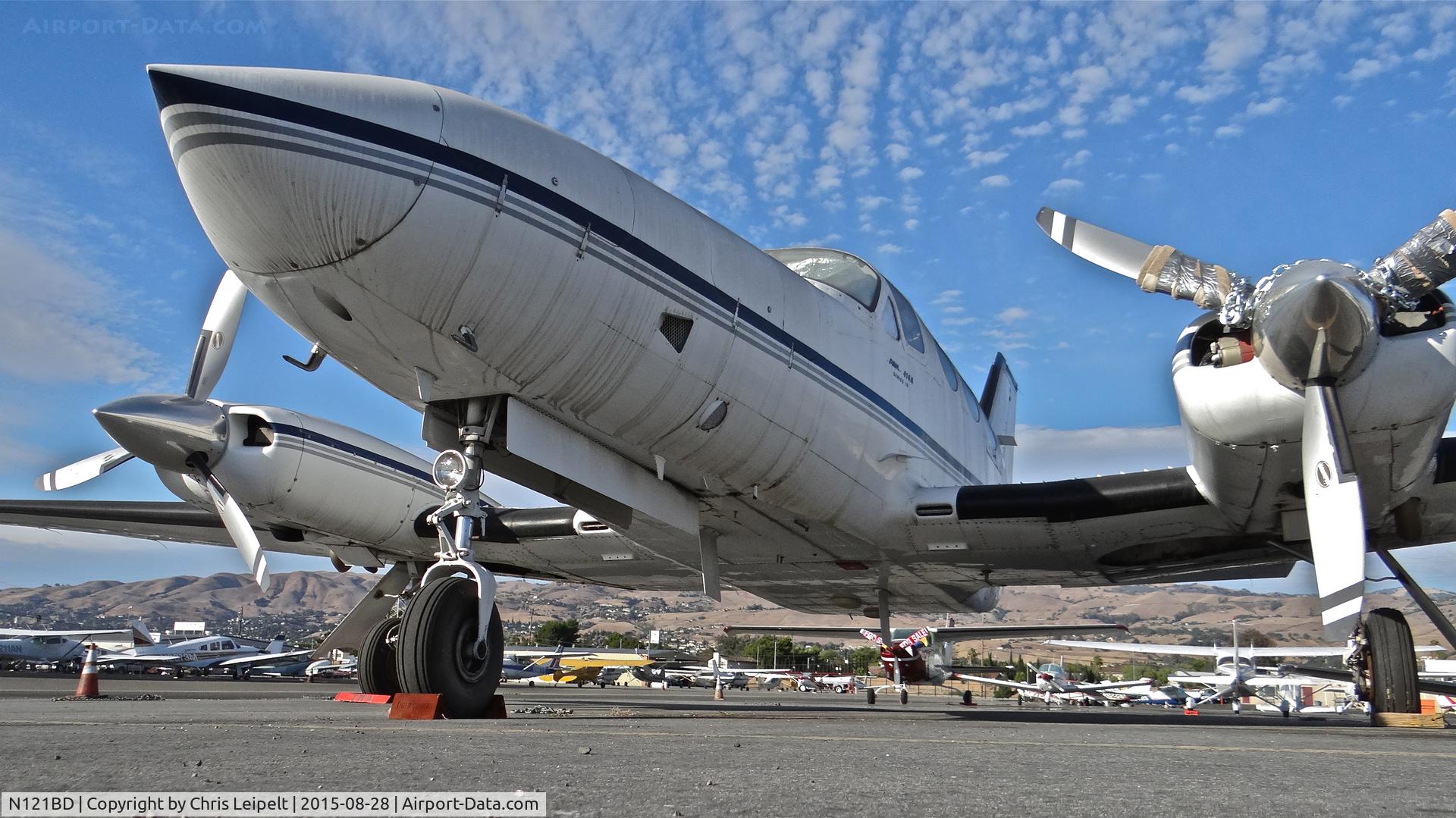 N121BD, 1979 Cessna 414A Chancellor C/N 414A0297, Locally-based 1979 Cessna 414A in a new parking spot on the Tradewinds ramp for maintenance. It will be a big job to fix it up since it hasn't flown since 2009, but I heard that TW started it up the other day, and it ran OK with the same engines.