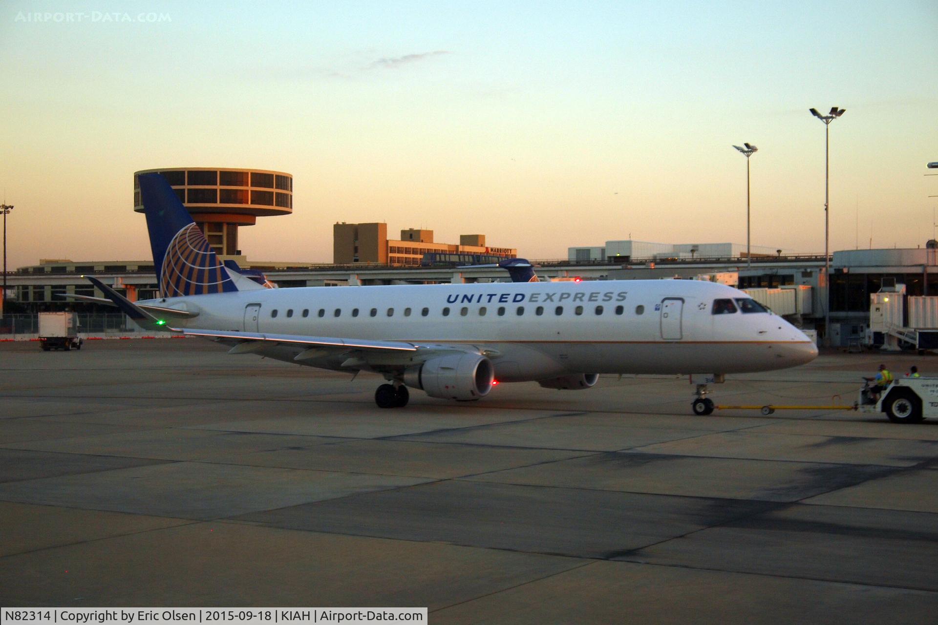 N82314, 2014 Embraer 175LR (ERJ-170-200LR) C/N 17000436, Embraer at IAH during sunset.