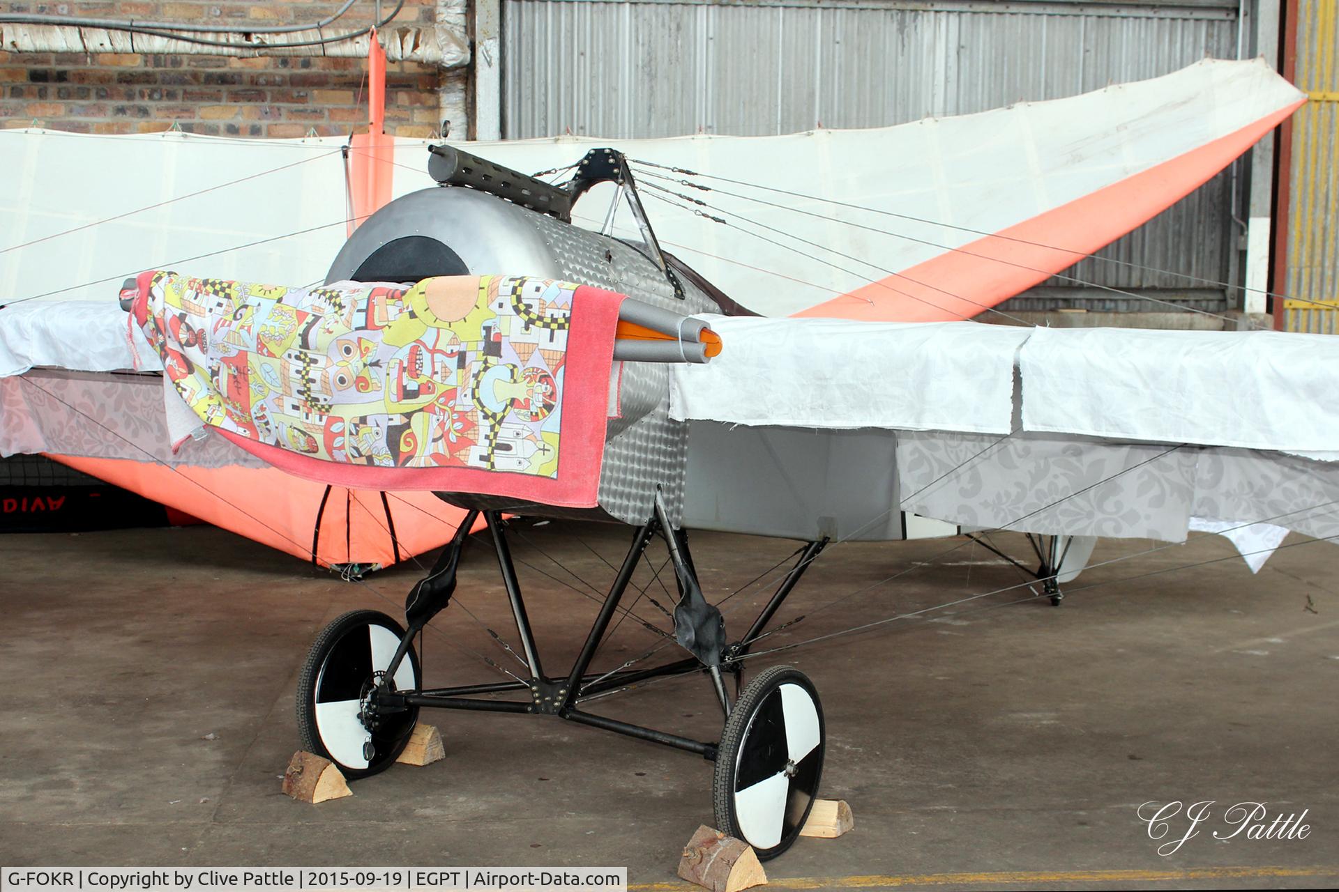 G-FOKR, 2009 Fokker E.III Eindecker 3/4 Replica C/N GS-103, Well covered up in a hangar at Perth EGPT - a great place to dry your tea towels.