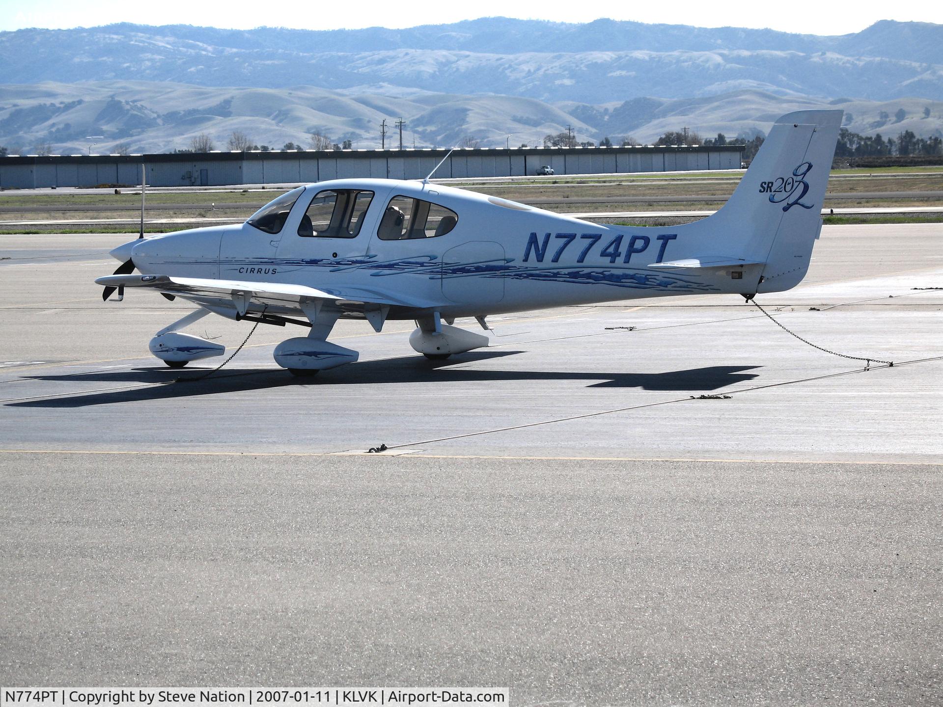 N774PT, 2006 Cirrus SR20 G2 C/N 1612, 2006 Cirrus SR20 with sun glare (sorry) @ Livermore Municipal Airport, CA (last reported with U.S. owner in France!)