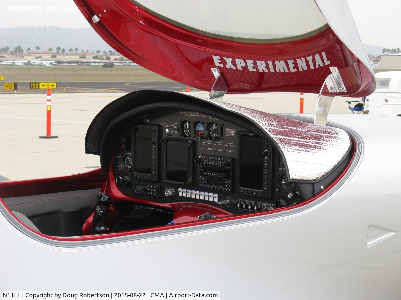 N11LL, 2013 Lancair Legacy C/N L2K-213, 2013 Ford LANCAIR LEGACY, Continental IO-550-N 300 Hp, glass panel befits its speed and performance. Note heat reflector over panel cowl, a nice display protective touch.