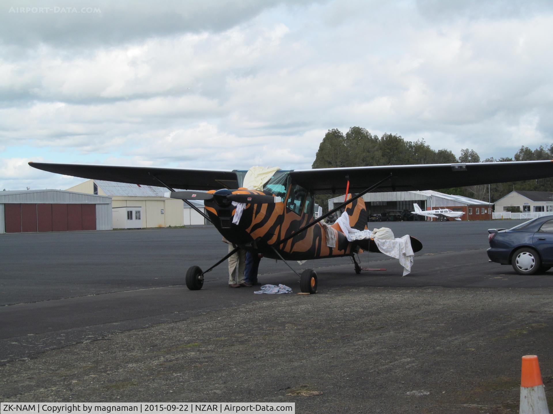 ZK-NAM, Cessna O-1F (305E) Bird Dog C/N 24106, ready for a bit of work outside home hangar at ardmore