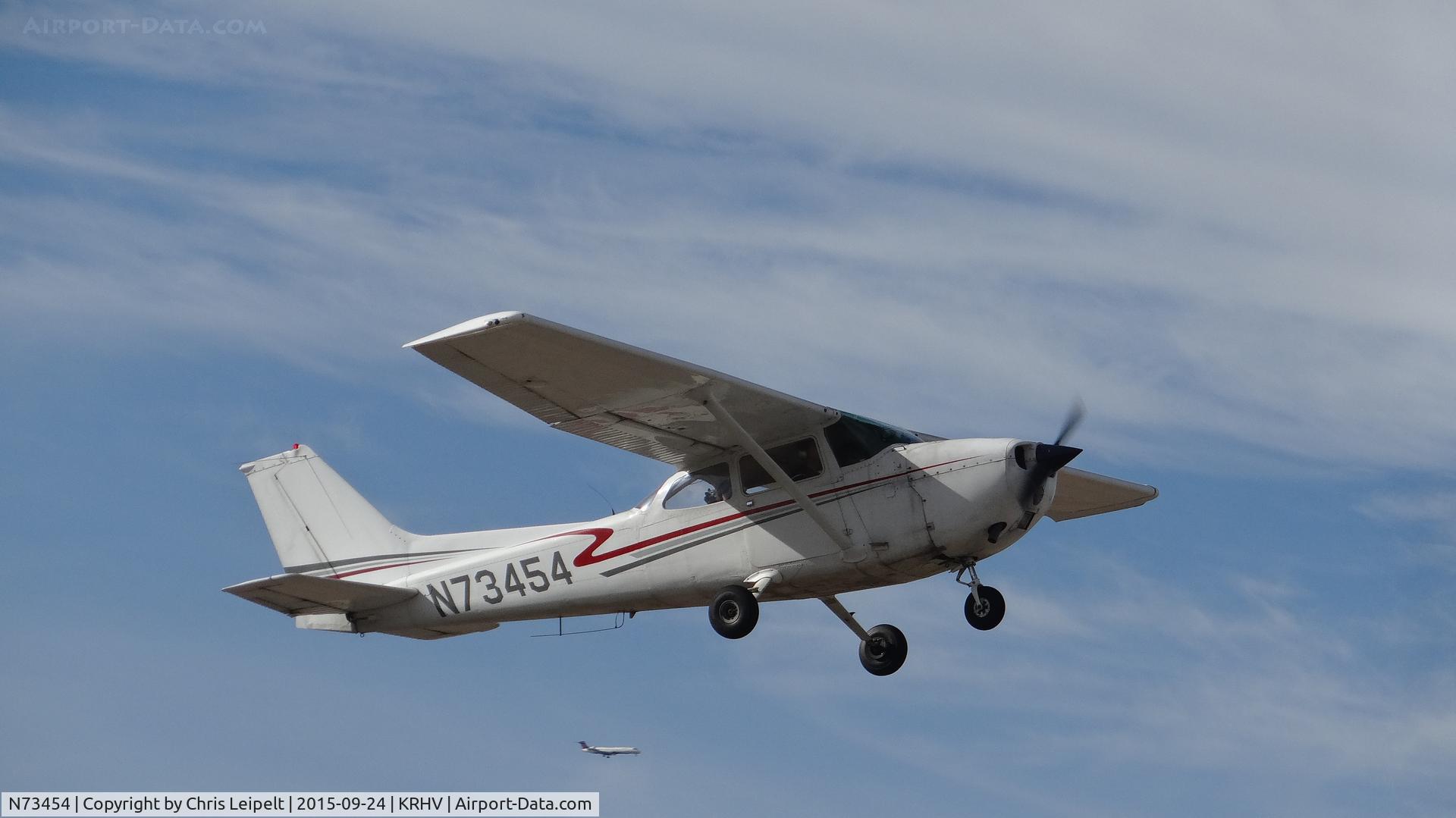 N73454, 1976 Cessna 172M C/N 17267472, Locally-based 1976 Cessna 172M departing runway 31R at Reid Hillview Airport, San Jose, CA. Note the Delta CRJ on final to nearby KSJC San Jose Intl Airport in background.