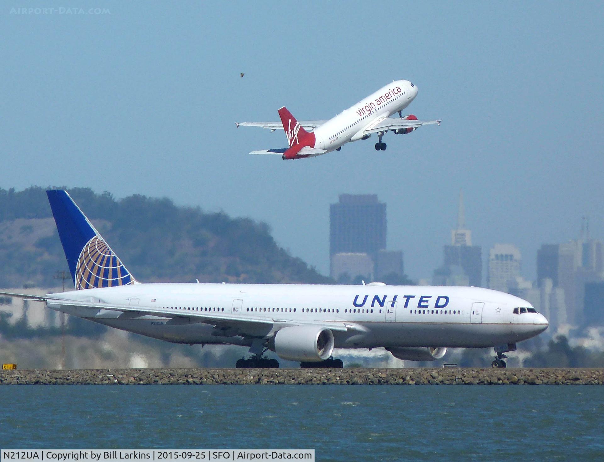 N212UA, 2000 Boeing 777-222 C/N 30218, Action with San Francisco in the background 12 miles away.